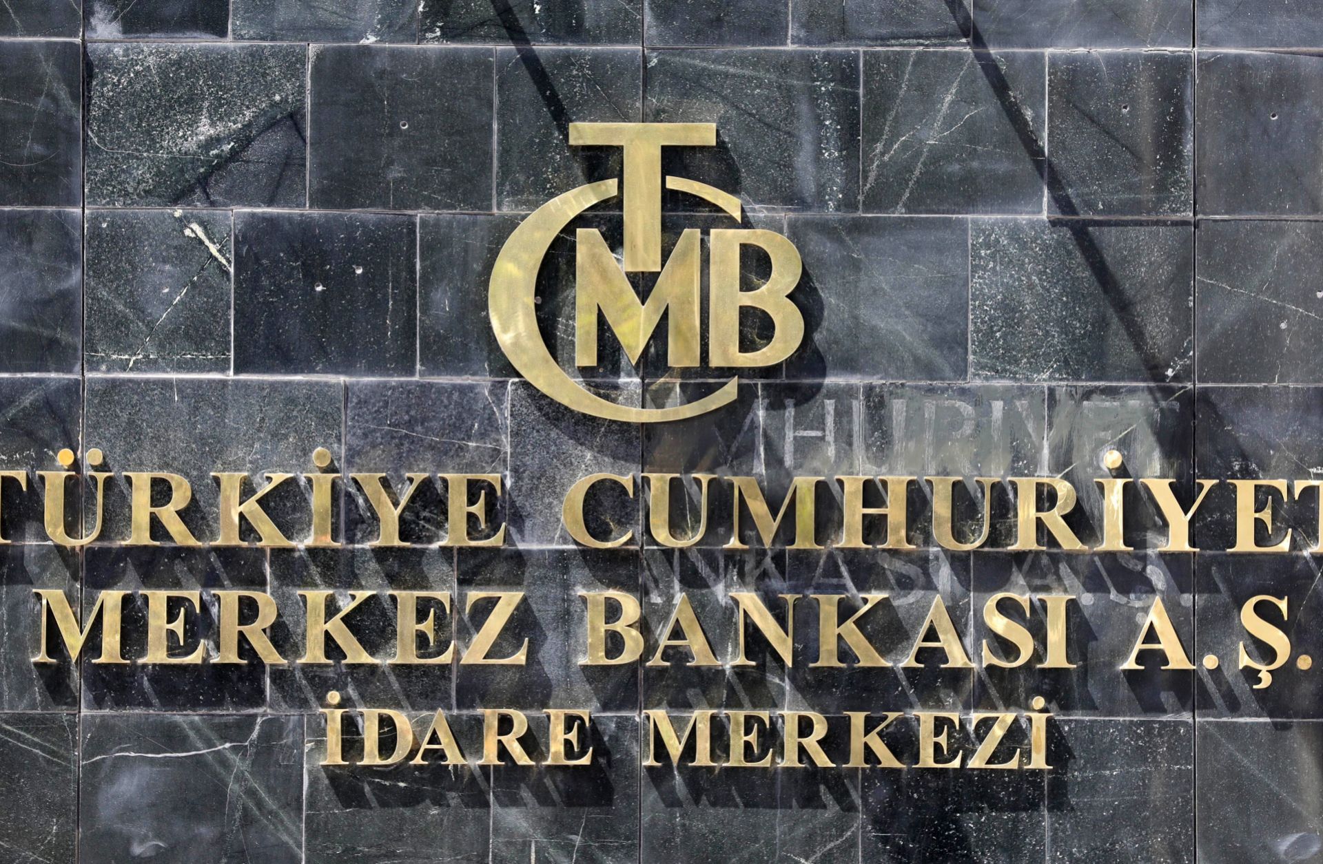 A picture taken on Aug. 14, 2018, shows the logo of Turkey's central bank at the entrance of its headquarters in Ankara. A picture taken on Aug. 14, 2018, shows the logo of Turkey's central bank at the entrance of its headquarters in Ankara.