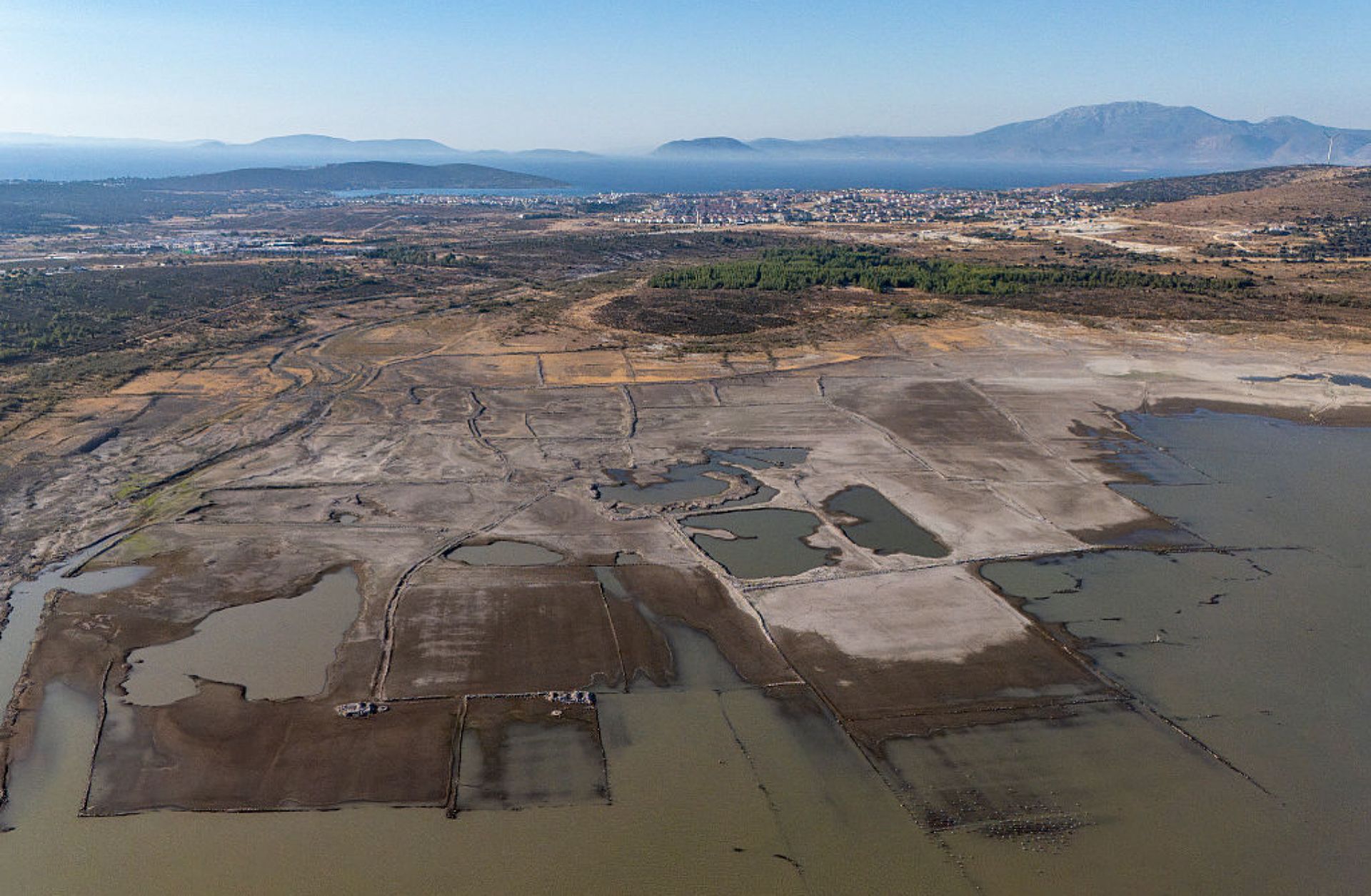 This aerial photograph shows dry areas near the Alacati Kutlu Aktas Dam in Izmir, Turkey, on July 30, 2025. 