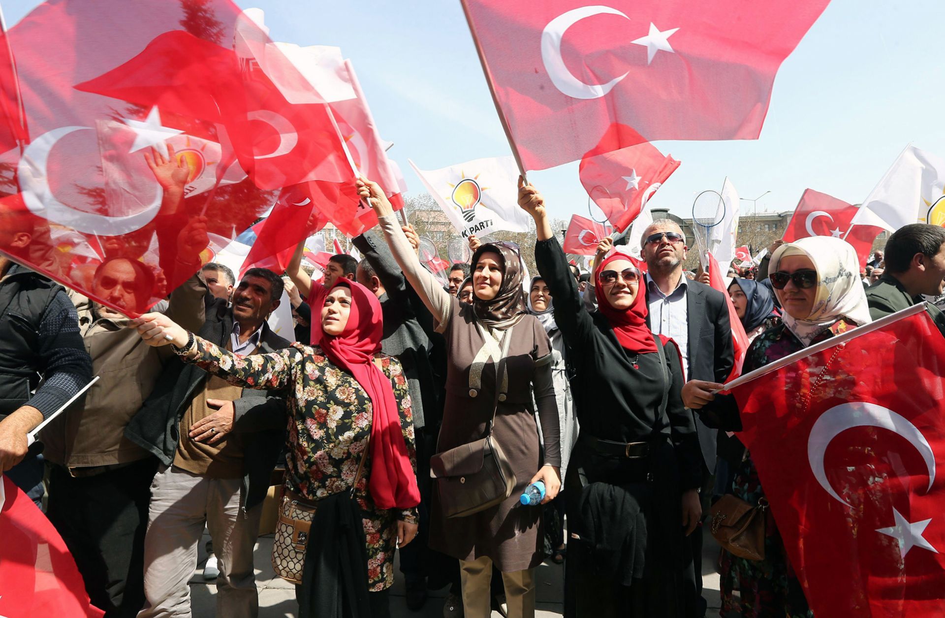 Supporters cheer for Ankara Mayor Melih Gokcek, a member of Turkey's ruling Justice and Development Party, on April 5, 2014.