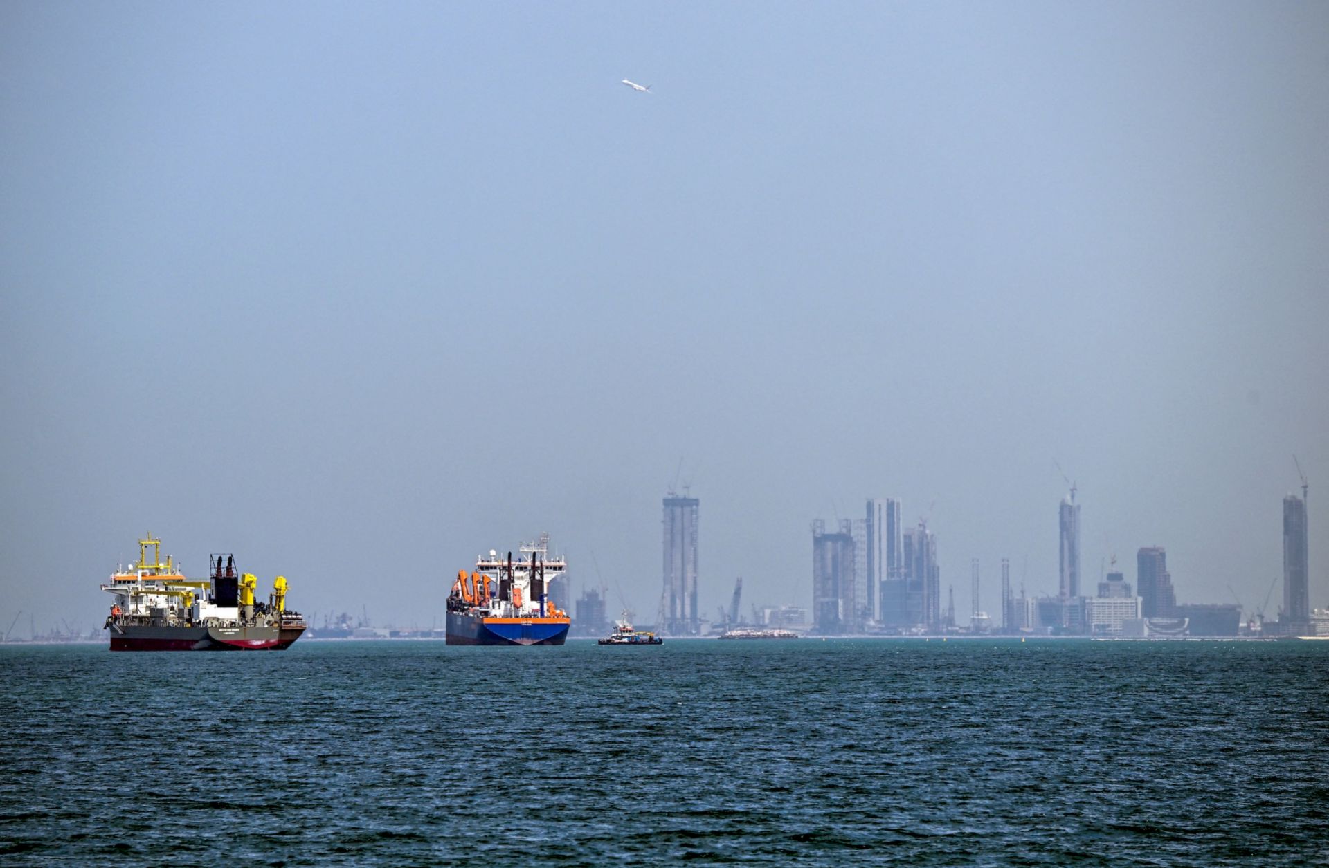 Commercial vessels are seen offshore in Dubai on March 11, 2026.