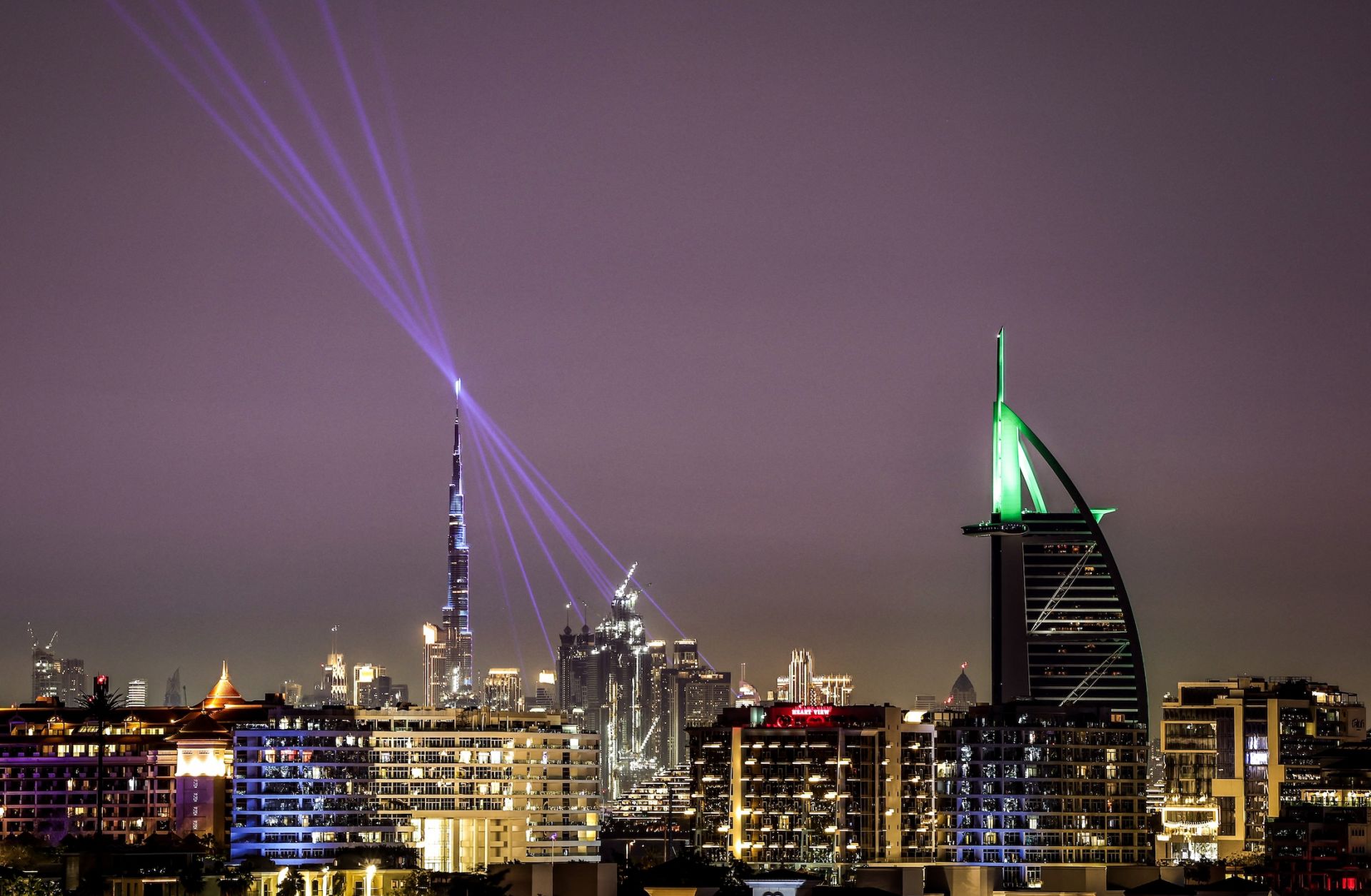 The Burj Khalifa skyscraper (L) and the Burj al-Arab hotel (R) on March 11 in Dubai, United Arab Emirates.