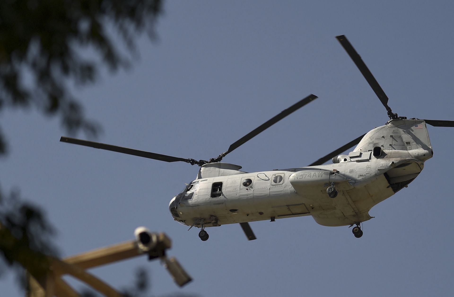 A U.S. military helicopter flies toward the Green Zone in Kabul, Afghanistan, on July 1, 2021.