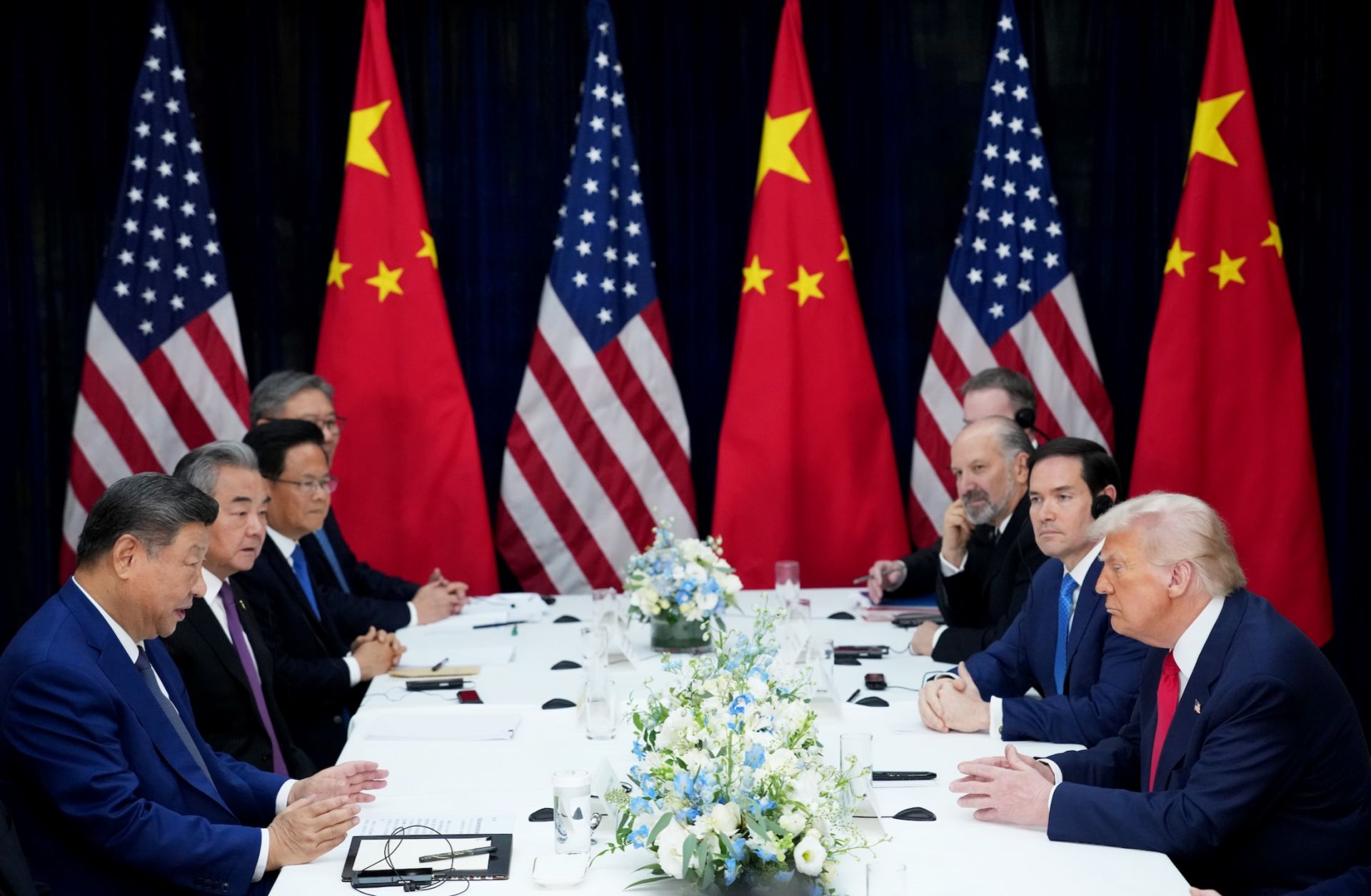 U.S. President Donald Trump (right) and Chinese President Xi Jinping attend a bilateral meeting in Busan, South Korea, on Oct. 30, 2025.