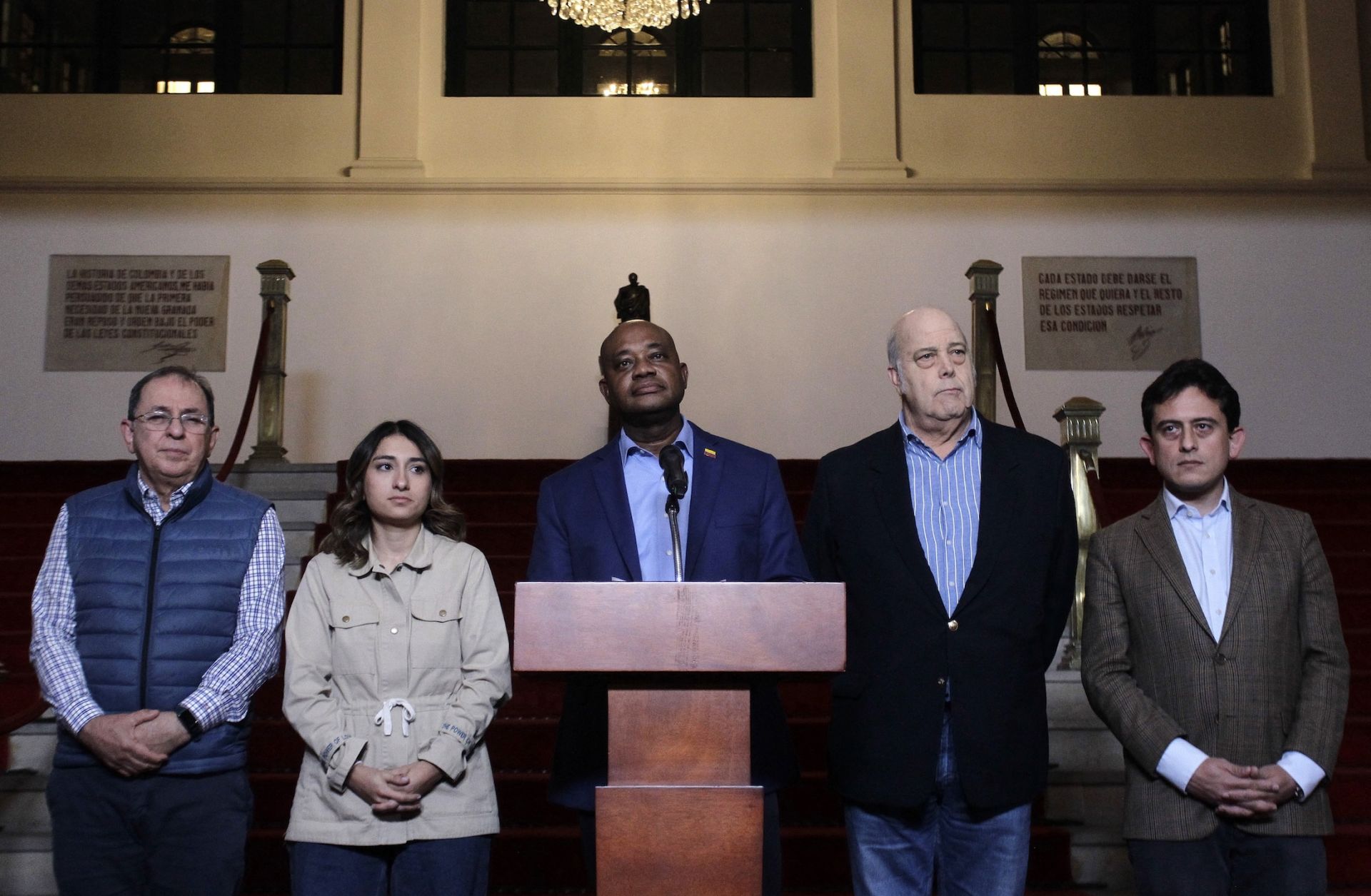 Colombian Foreign Relations Minister Luis Gilberto Murillo (C) looks on with other Colombian officials during a Jan. 26 press conference on a diplomatic dispute with the United States at the San Carlos Palace in Bogota, Colombia. 
