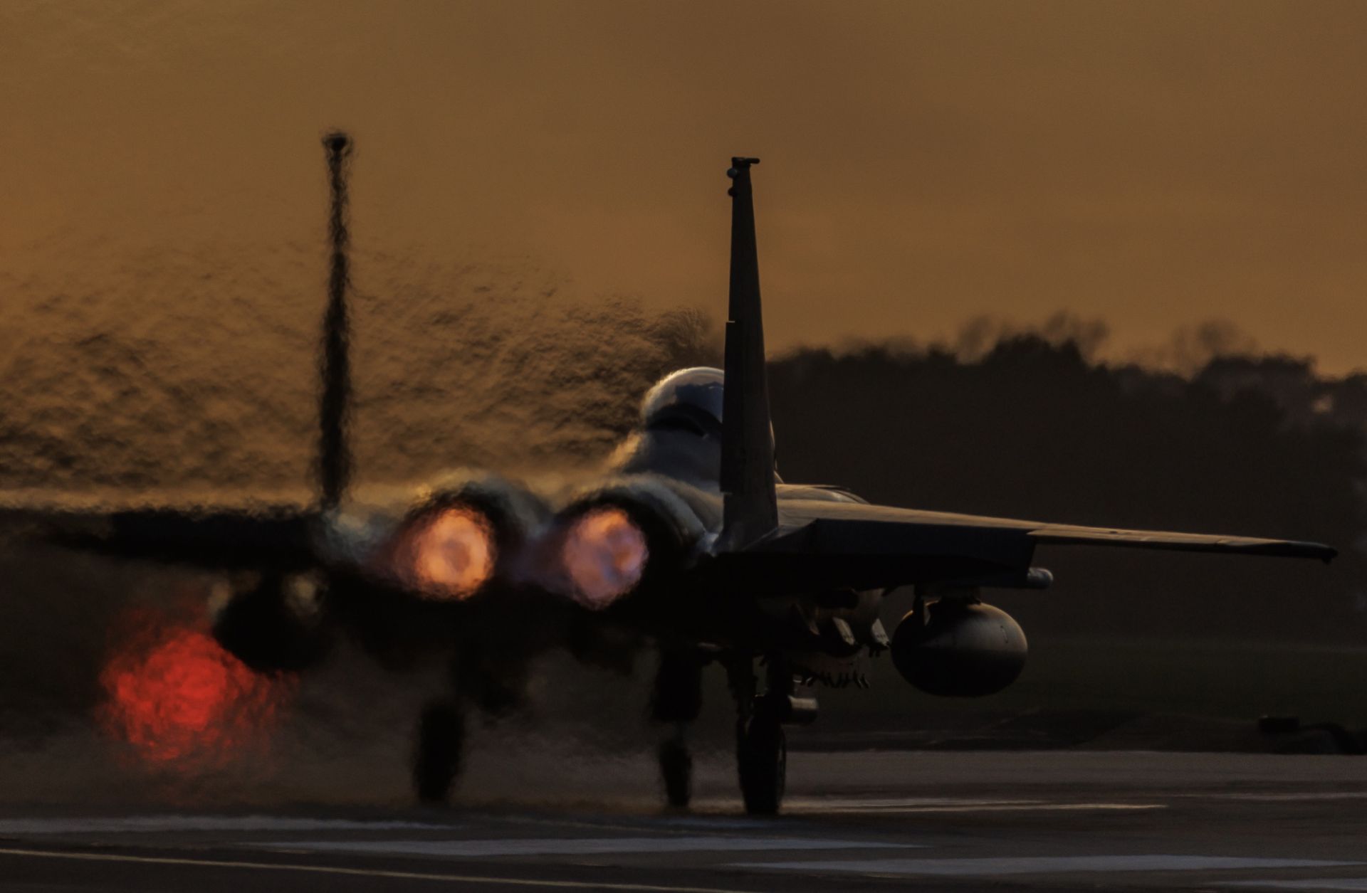 An F-15 fighter plane takes off from RAF Lakenheath at sunset on Jan. 7, 2026 in Mildenhall, the United Kingdom.