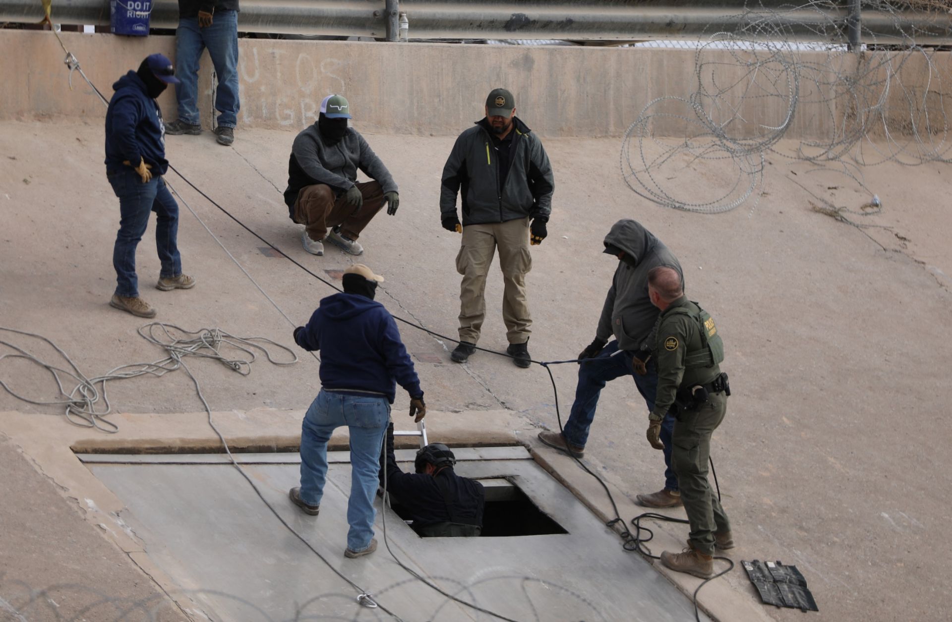 Migrants from Mexico and Guatemala are apprehended by U.S. Customs and Border Patrol officers after crossing a section of the U.S.-Mexico border in Ruby, Arizona, on Jan. 4, 2025.