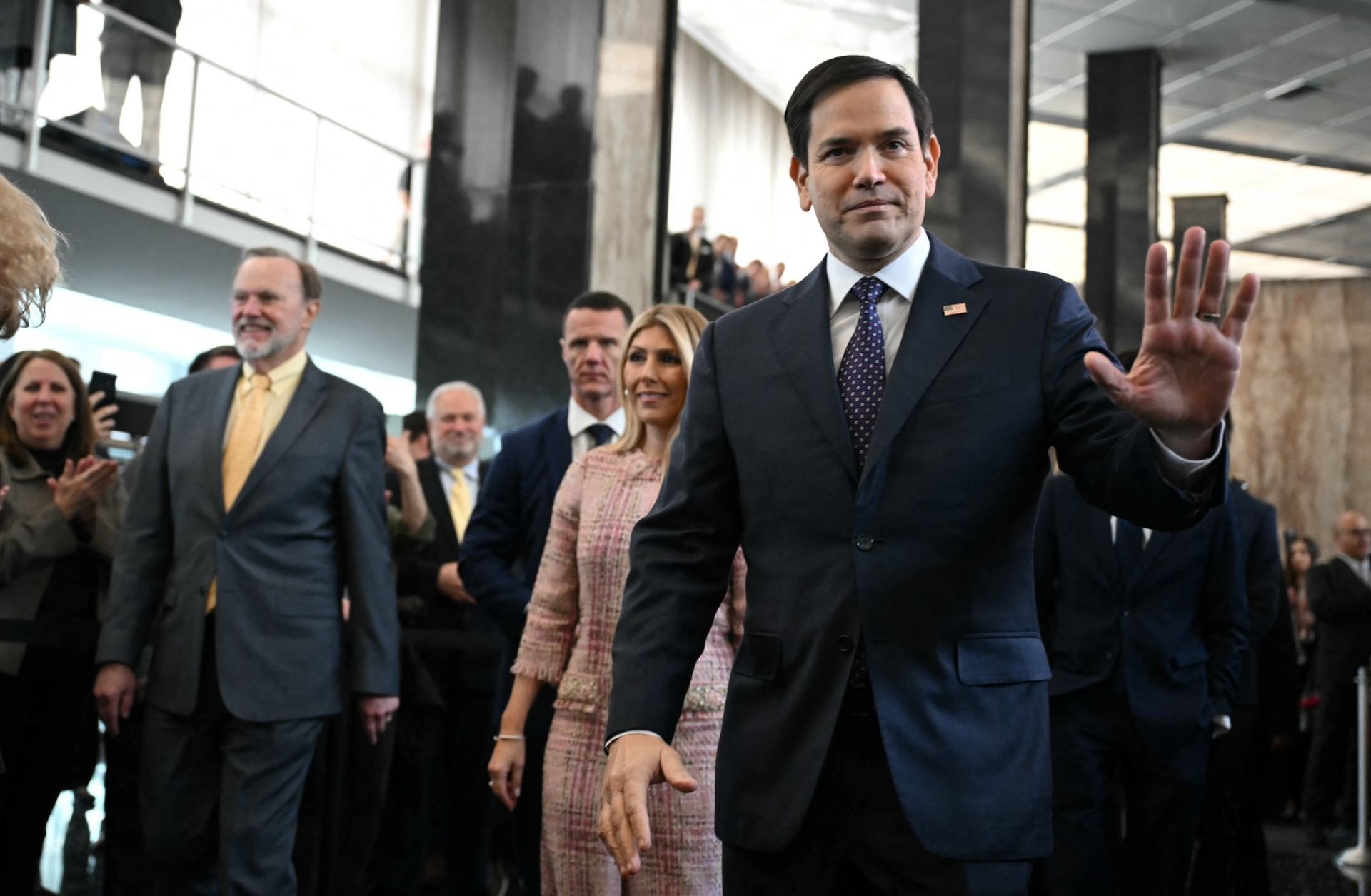 U.S. Secretary of State Marco Rubio and his wife Jeanette Rubio arrive at the State Department in Washington, D.C., to speak to employees on Jan. 21, 2025. 