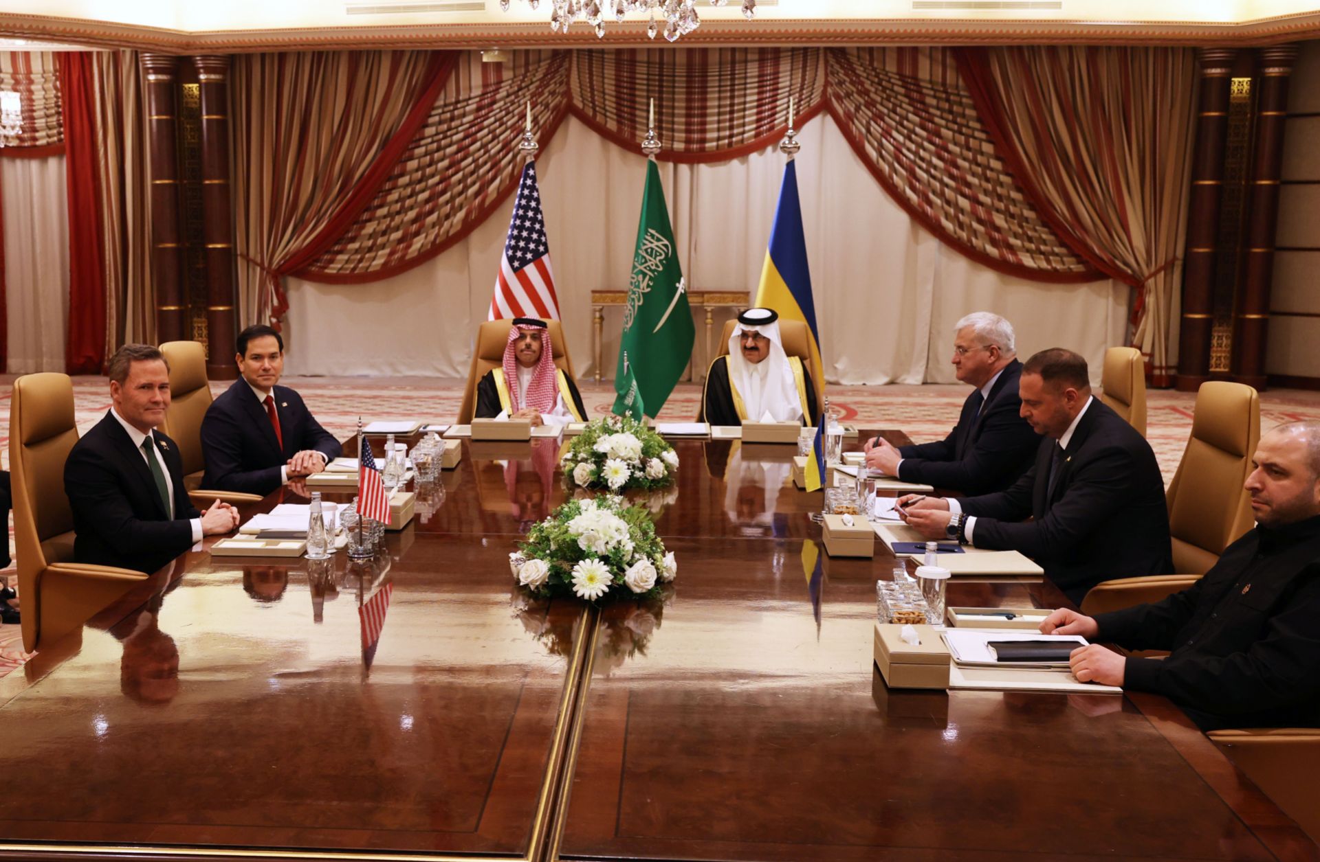 U.S. National Security Advisor Mike Waltz, U.S. Secretary of State Marco Rubio, Saudi Foreign Minister Faisal bin Farhan and National Security Advisor Mosaad bin Mohammad al-Aiban, Ukrainian Foreign Minister Andrii Sybiha, Ukrainian Head of Presidential Office Andriy Yermak and Ukrainian Minister of Defense Rustem Umerovto attend a meeting between the US and Ukraine hosted by the Saudis on March 11, 2025 in Jeddah, Saudi Arabia