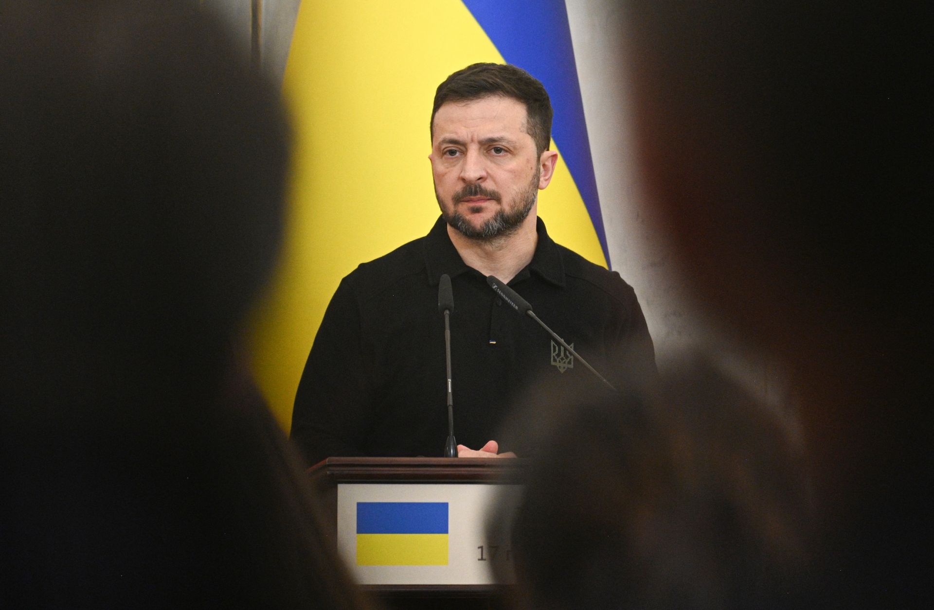 Ukrainian President Volodymyr Zelensky looks on during a joint press conference with Poland's prime minister in Lviv on Dec. 17, 2024.