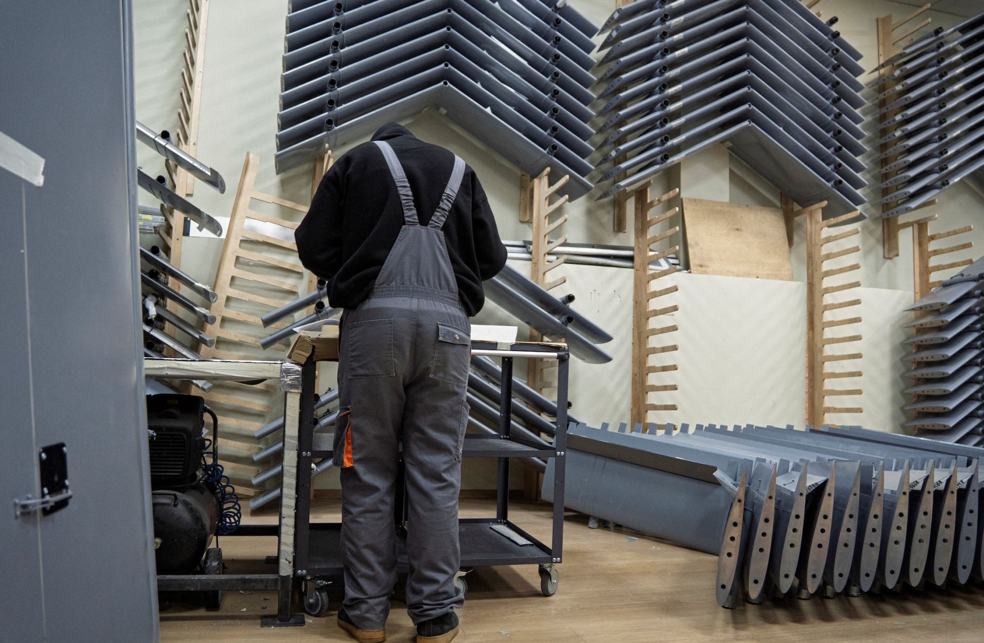 An employee assembles a long-range drone in a workshop of the Fire Point company, which manufactures FP-1 deep-strike drones and FP-2 strike drones, Jan. 29 in an undisclosed location in Ukraine.