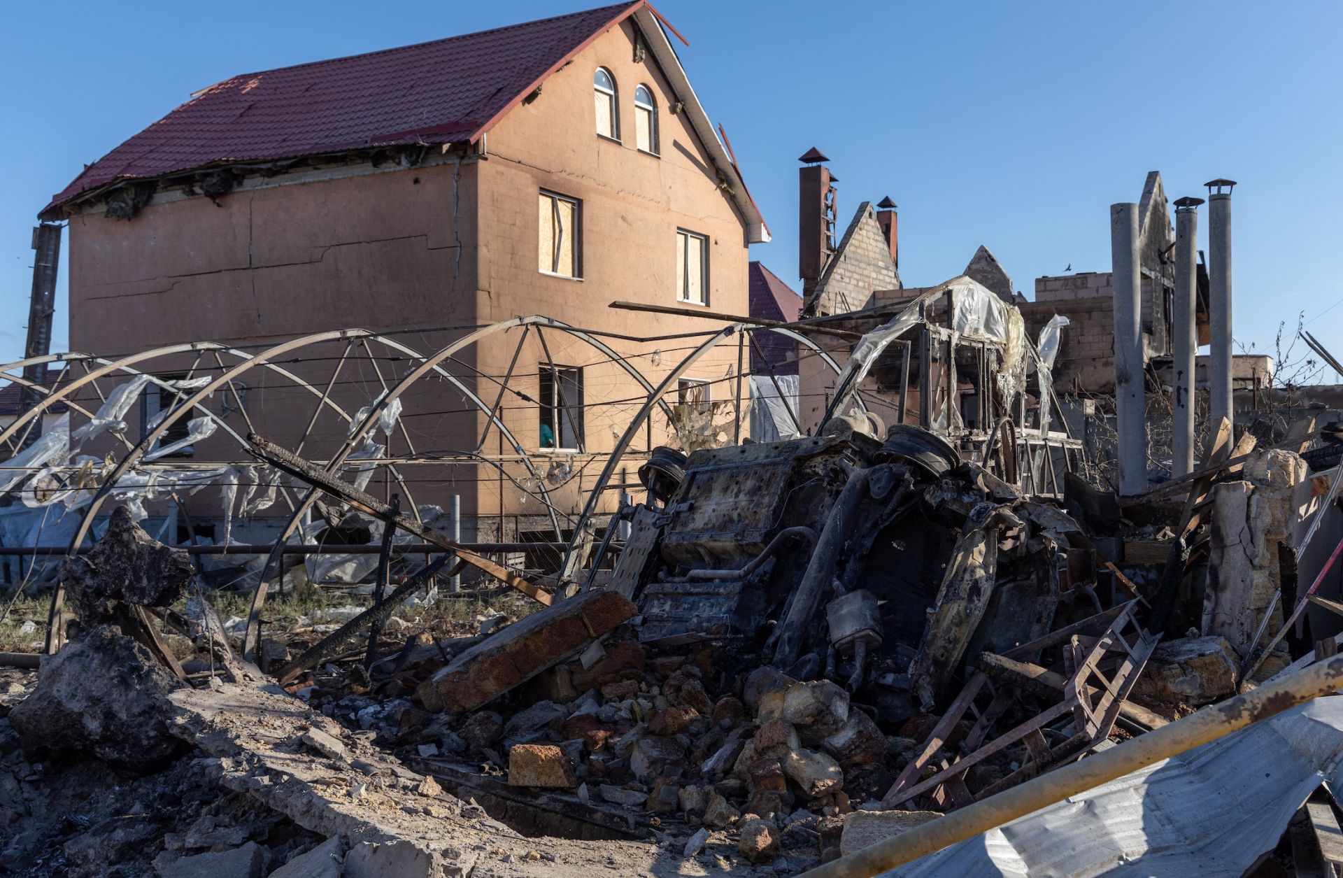 Debris lies in the courtyard of a damaged house following a missile attack at an undisclosed location in Ukraine's Odesa region on Nov. 17, 2024.