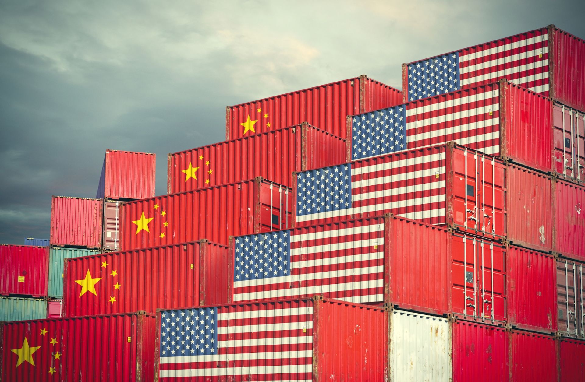 Cargo containers painted with Chinese and U.S. flags.