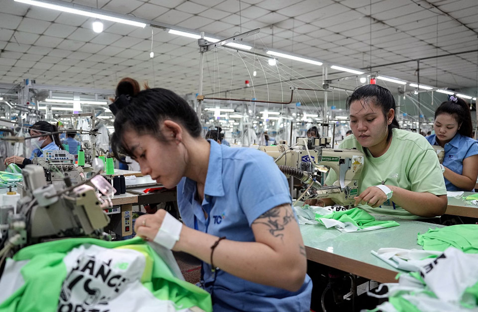 Vietnamese garment workers stitch apparel at a factory in Ho Chi Minh City, Vietnam, on April 3, 2025, after U.S. President Donald Trump unveiled sweeping new tariffs on trading partners.