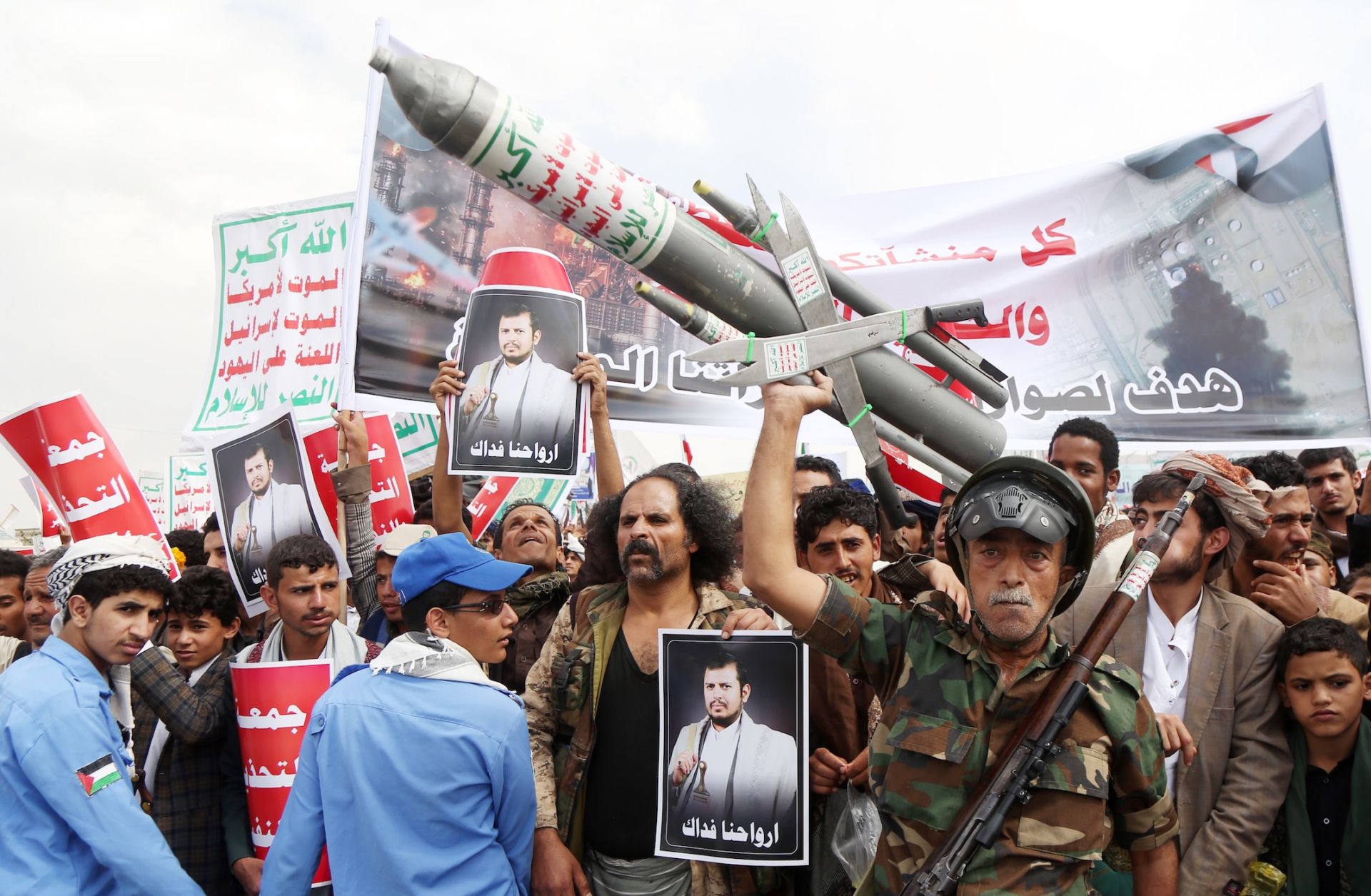 Yemeni protesters take part in a demonstration held to send a message of defiance against the continued siege and any military escalation involving Saudi forces against Houthi-controlled northern Yemen on July 17. 