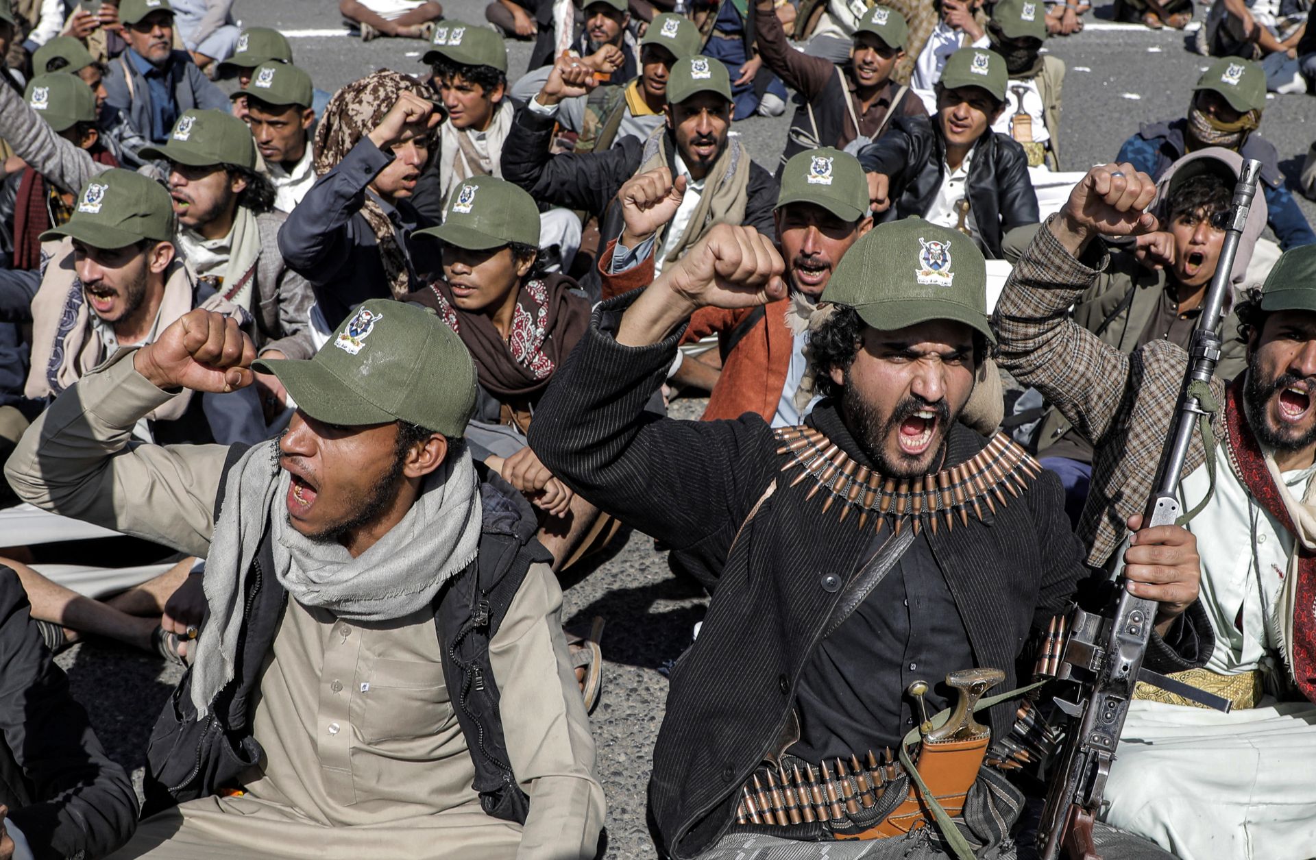 Fighters loyal to Yemen's Houthi group chant in Sanaa, Yemen, on Sept. 21, 2024, during a military parade marking the anniversary of the Houthis’ 2014 takeover of the capital.