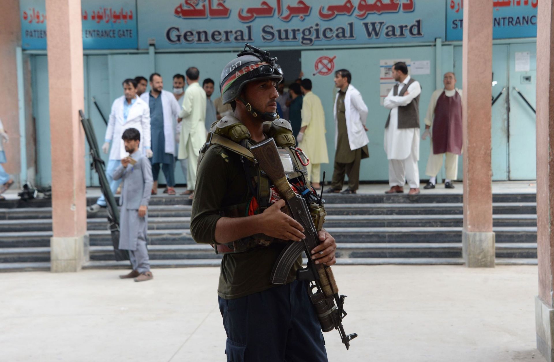 An Afghan police officer stands guard after a political rally was attacked in Nangarhar province in early October.