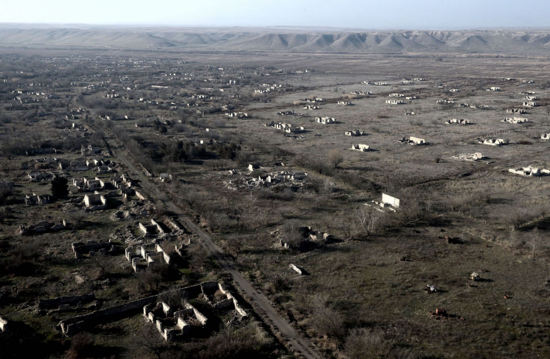 An aerial view shows the ruins of a village on Jan. 5, 2021, in an area of Nagorno-Karabakh that was recaptured by Azerbaijan in October 2020. An aerial view shows the ruins of a village on Jan. 5, 2021, in an area of Nagorno-Karabakh that was recaptured by Azerbaijan in October 2020.