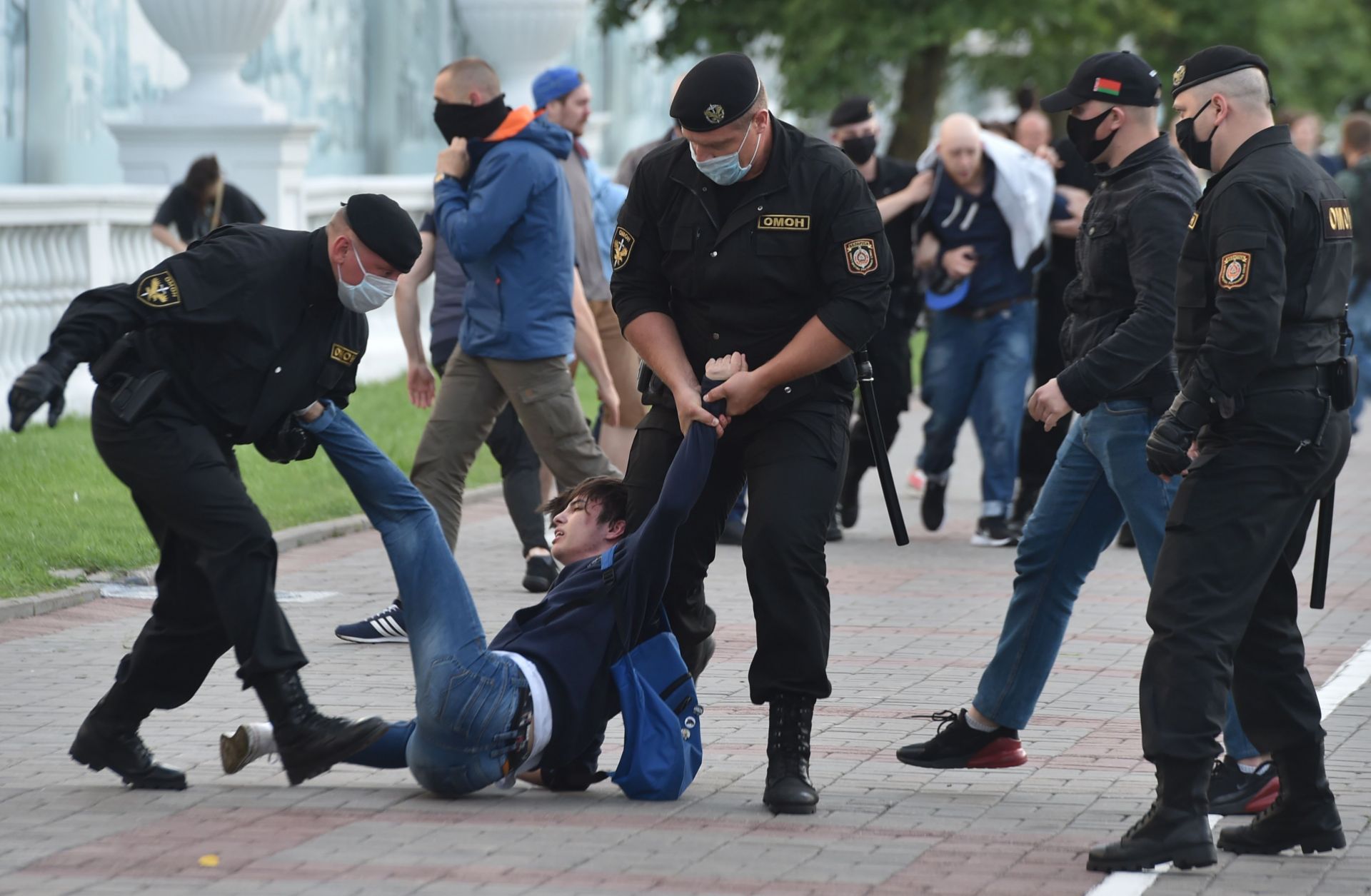 Plainclothed Belarus' security forces and riot police officers detain a protester at an opposition demonstration in Minsk, Belarus, on July 14, 2020. Plainclothed Belarus' security forces and riot police officers detain a protester at an opposition demonstration in Minsk, Belarus, on July 14, 2020.