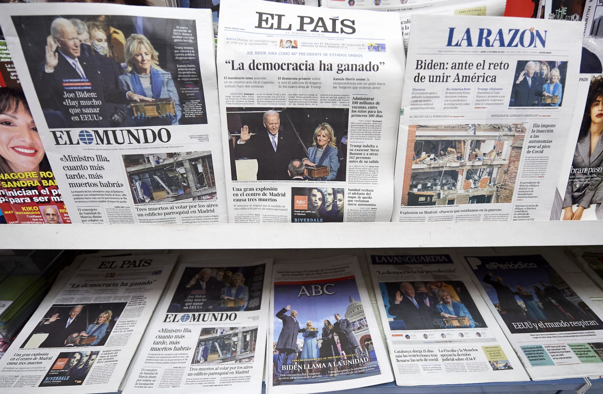 Spanish newspapers show images of newly sworn-in U.S. President Joe Biden on Jan. 21, 2021, in Madrid, Spain.