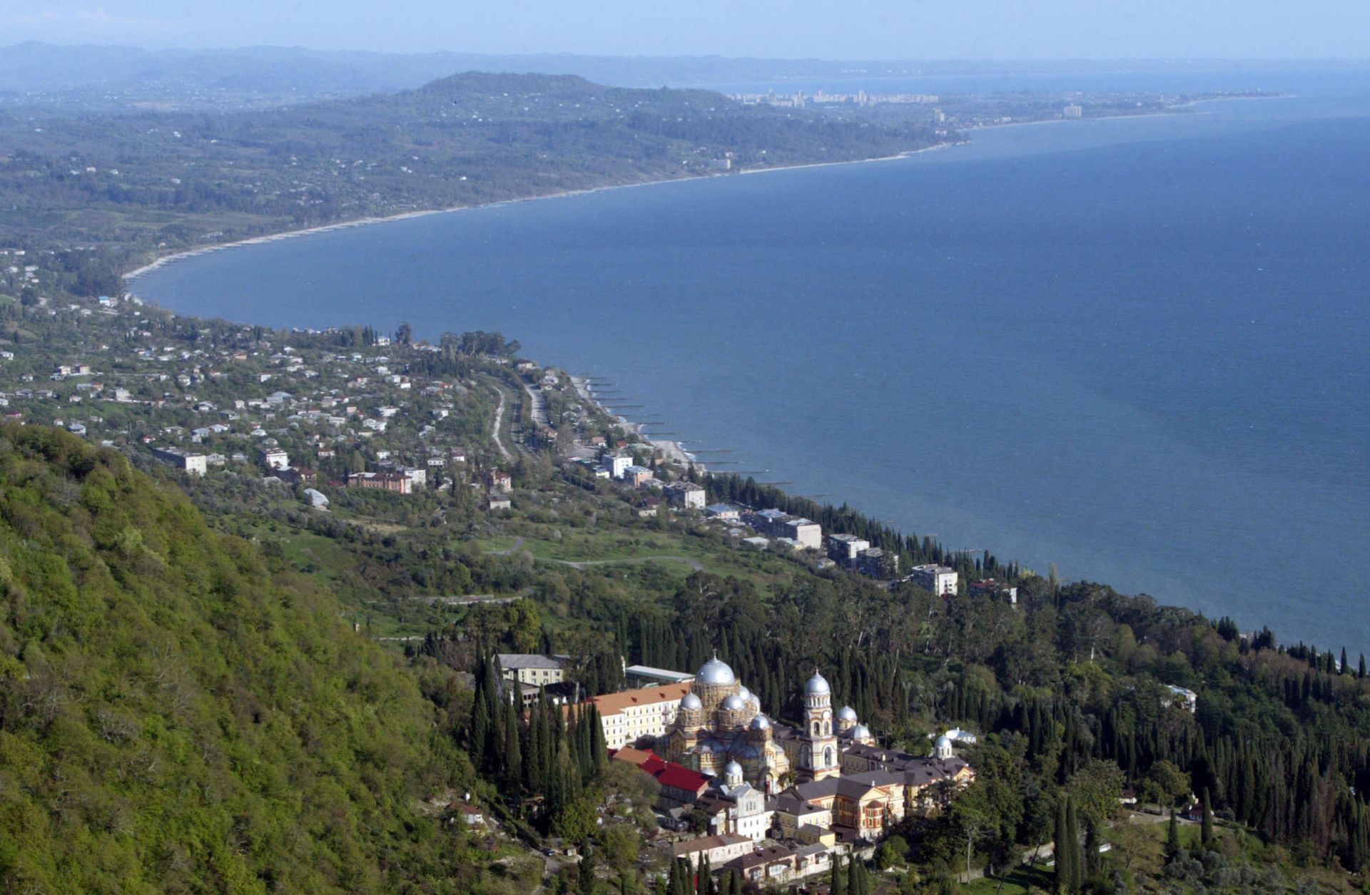 A photograph shows Abkhazia's Black Sea coast. 