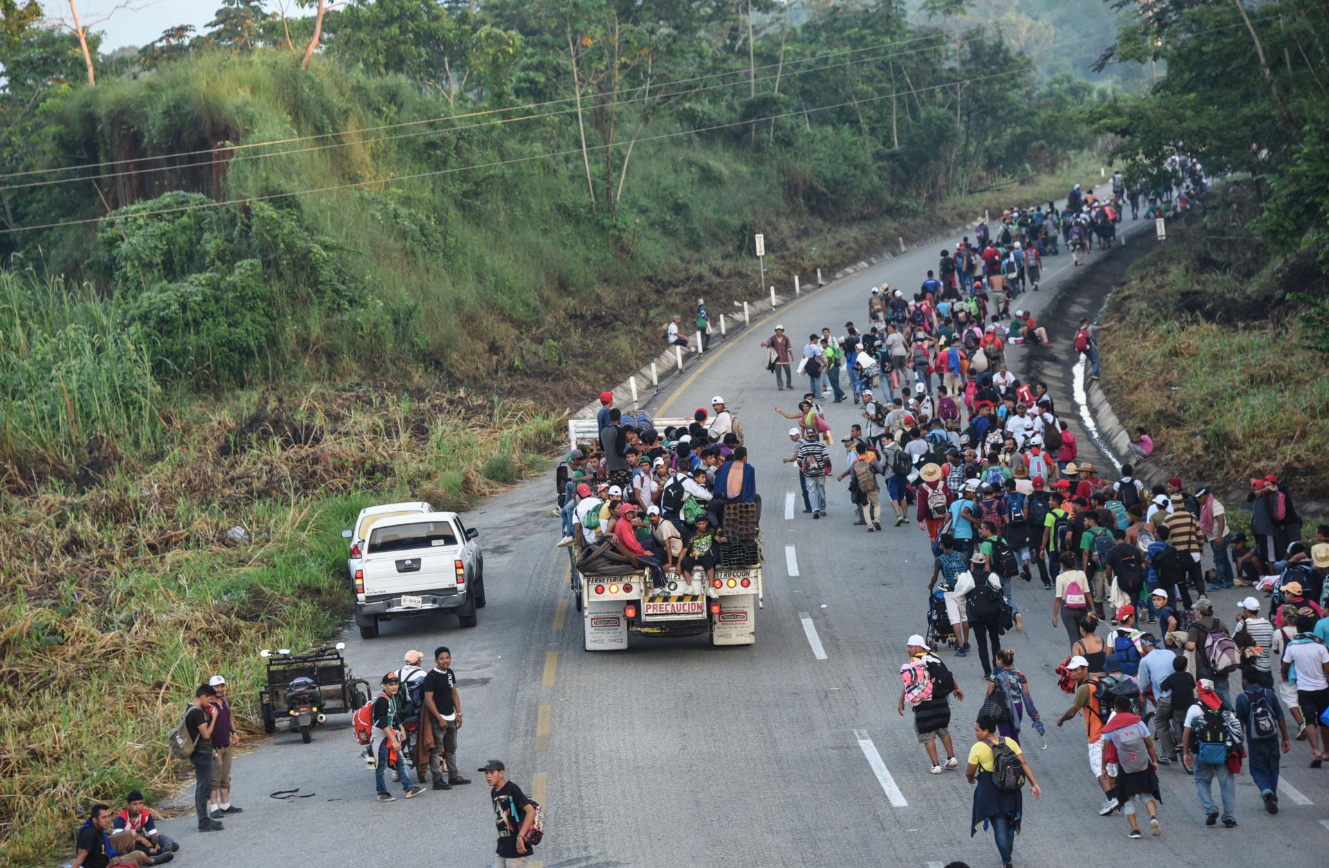 Central American migrants near Huixtla in the Mexican state of Chiapas head toward the United States more than 1,000 miles away on Oct. 24.