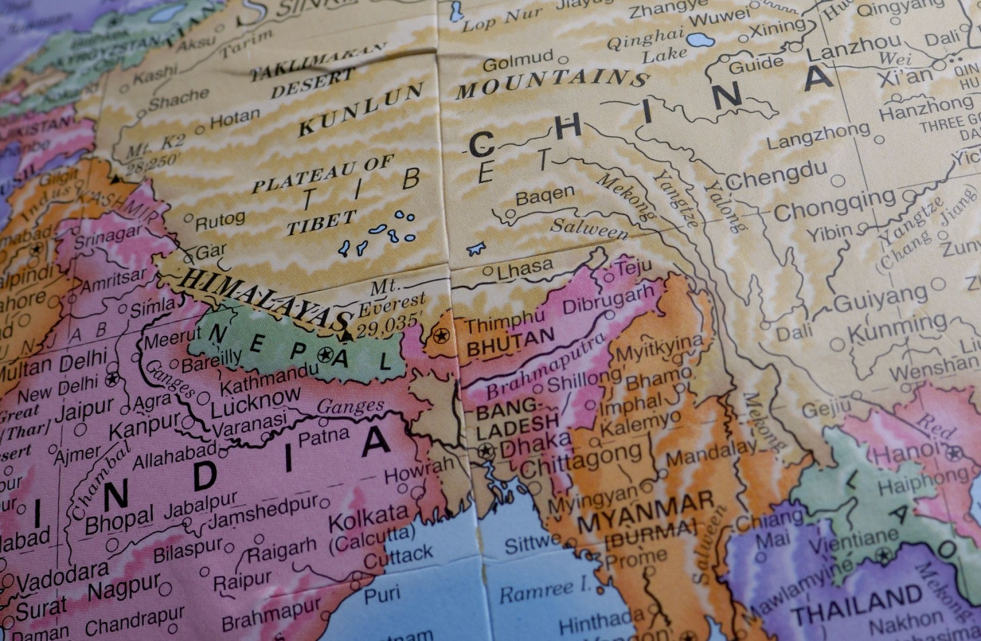 In this photo, a map shows the positions of China and India on the globe.