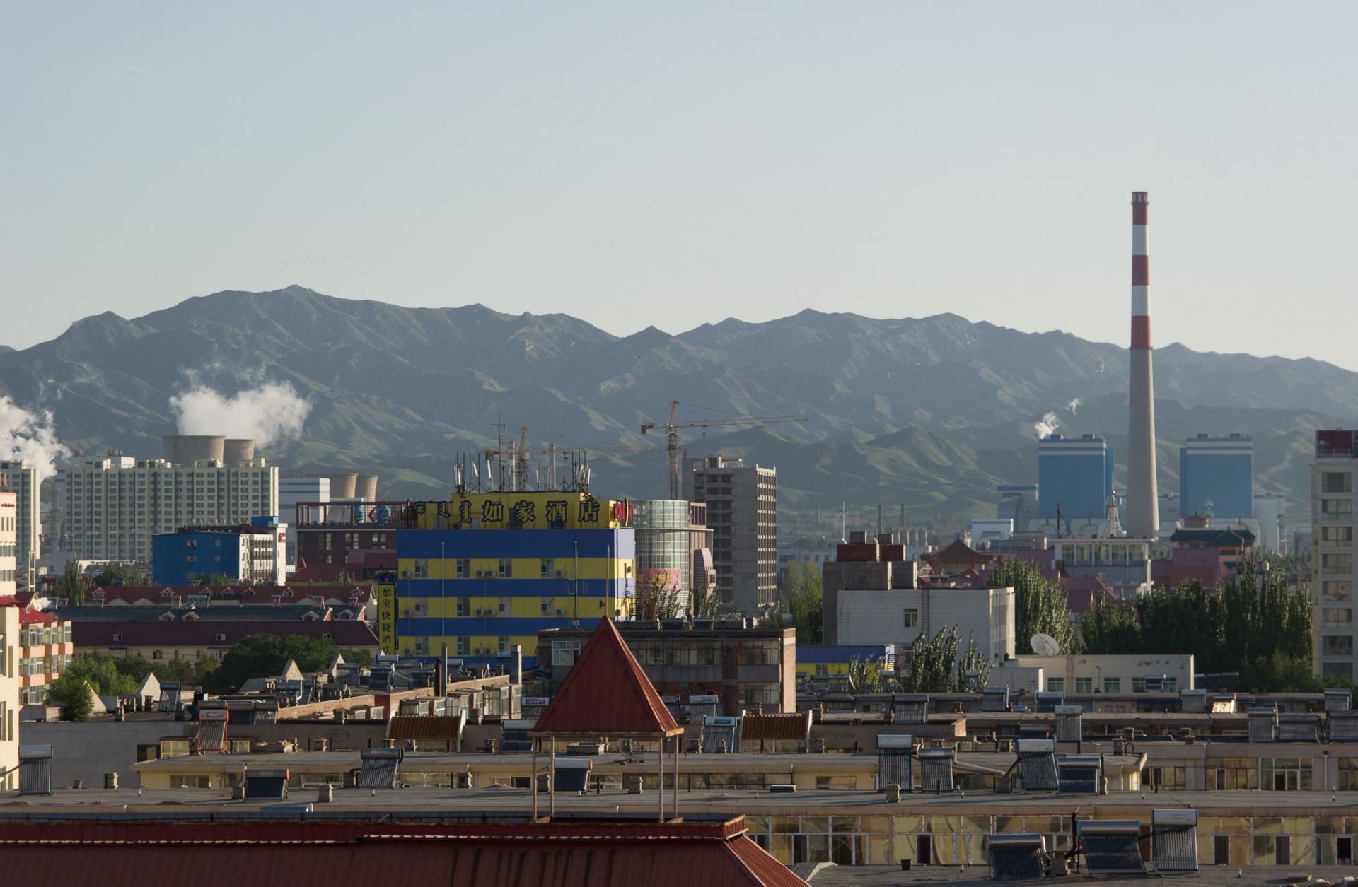China is the top supplier of rare earth elements. The skyline of the Inner Mongolian city of Baotou is blackened by pollution from factories processing rare earth elements, which are essential for the production of mobile phones and computers.