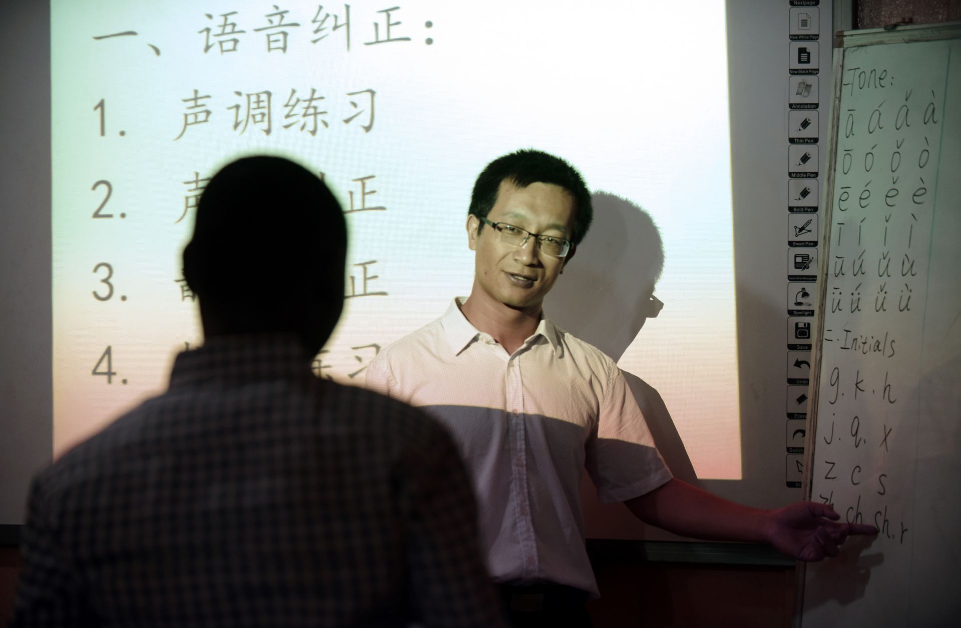 An instructor gives a lesson in Chinese language at a Confucius Institute in Lagos, Nigeria, in April 2016.