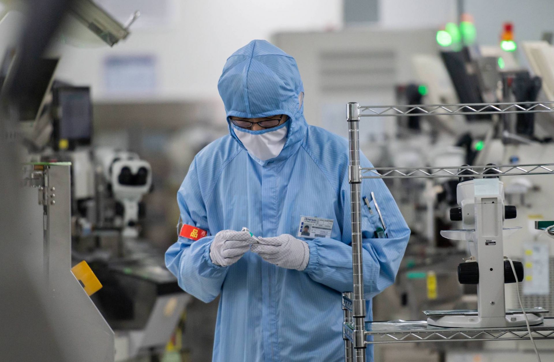 A worker is seen inside the production chain at Renesas Electronics in Beijing, China, on May 14, 2020. 