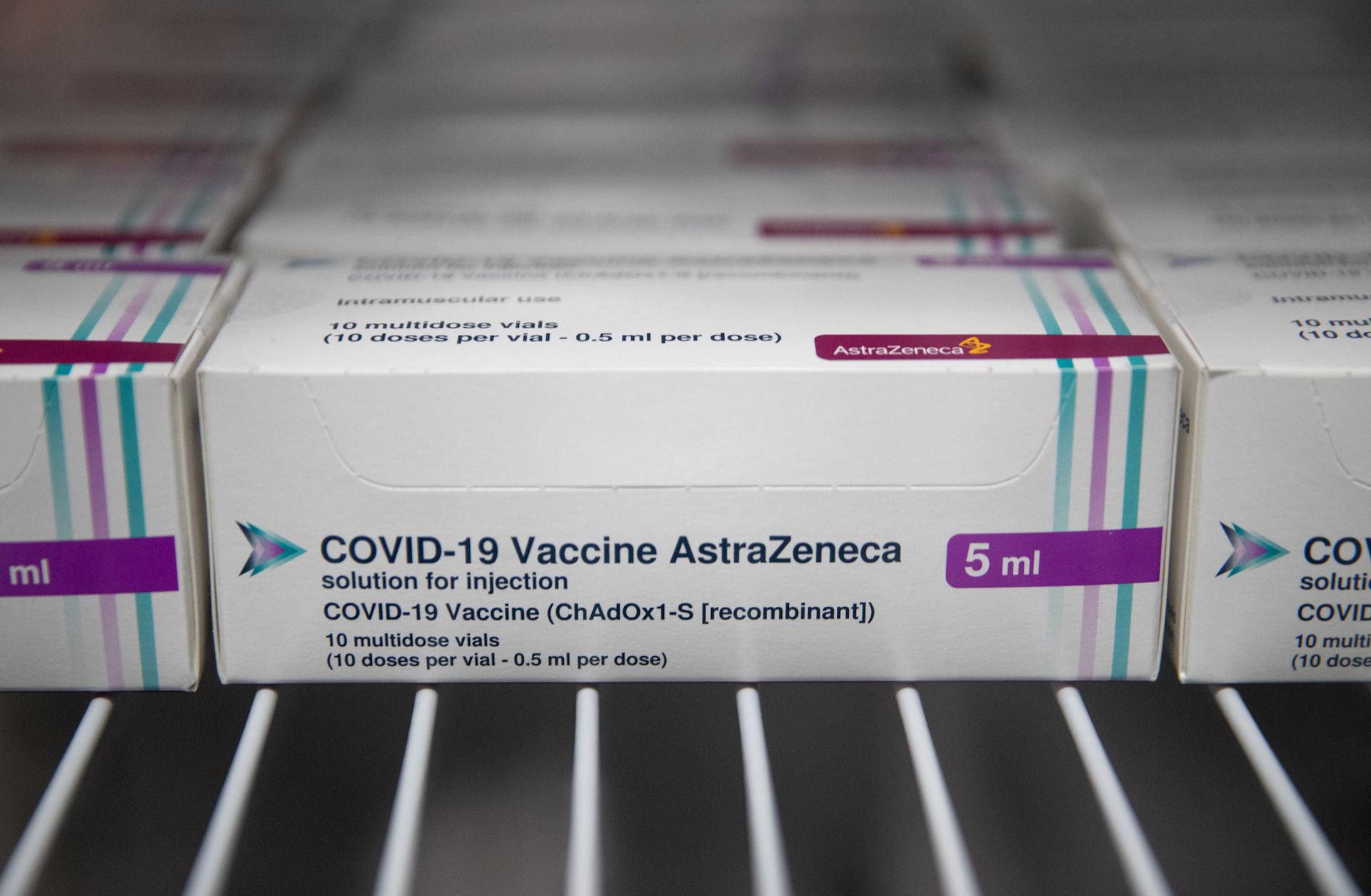 Boxes of vials of the AstraZeneca COVID-19 vaccine sit in a refrigerator at Ashton Gate Stadium in the English city of Bristol on Jan. 9, 2021.