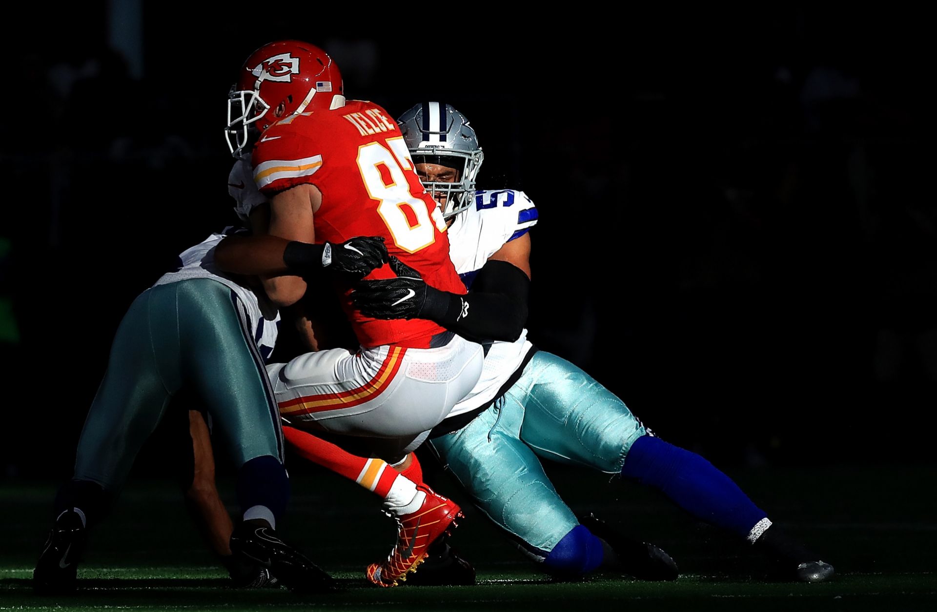 Dallas Cowboys player Damien Wilson tackles a member of the Kansas City Chiefs in a game in Arlington, Texas, on Nov. 5, 2017. 