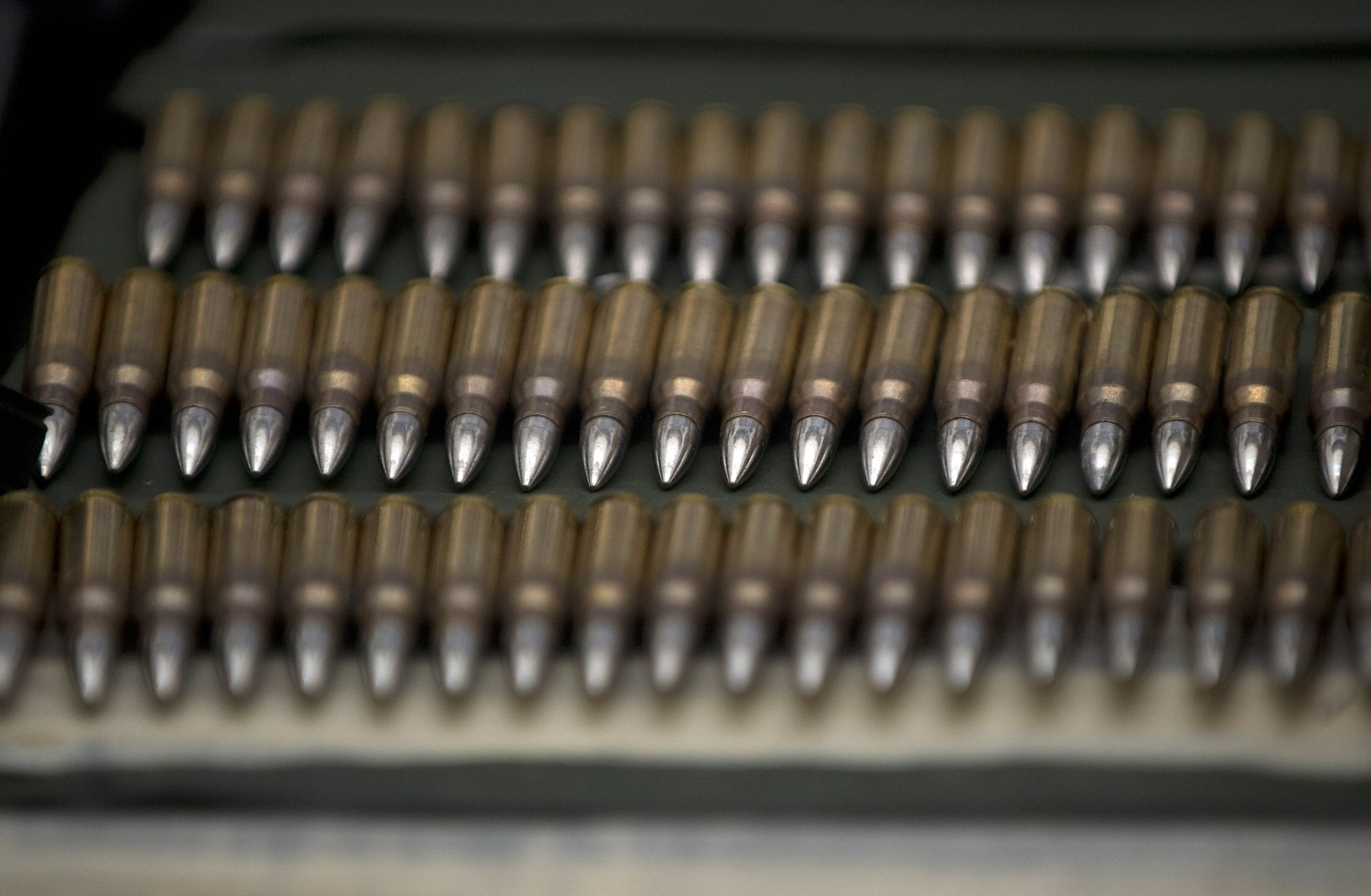 Officials display rifle ammunition seized from the Los Zetas drug cartel in June 2011.