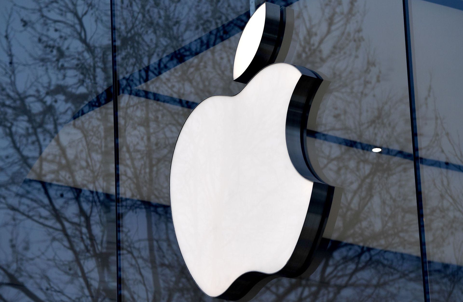 The logo for Apple Inc. adorns a storefront in the Belgian capital.