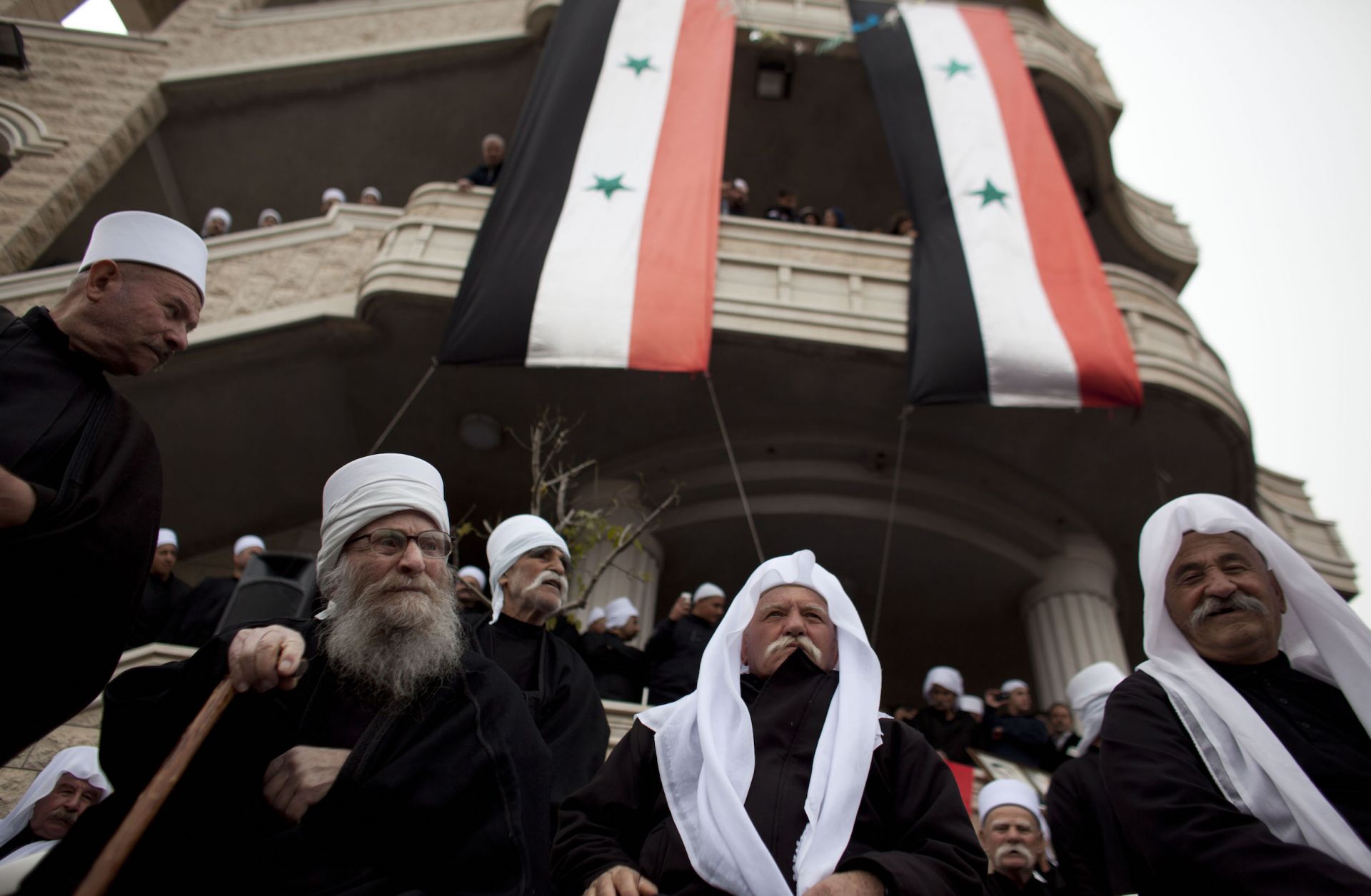Druze men rally in support of the Syrian government in February 2012 in Majdal Shams, a Druze town on the Israeli-controlled side of the Golan Heights.