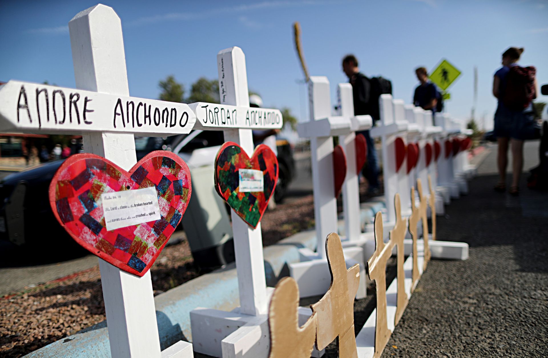 Greg Zanis, a retired carpenter, made the crosses and has made thousands of them for victims of mass shootings and disasters. Handmade crosses memorialize the victims of a mass shooting in El Paso, Texas, on Aug. 5, 2019.