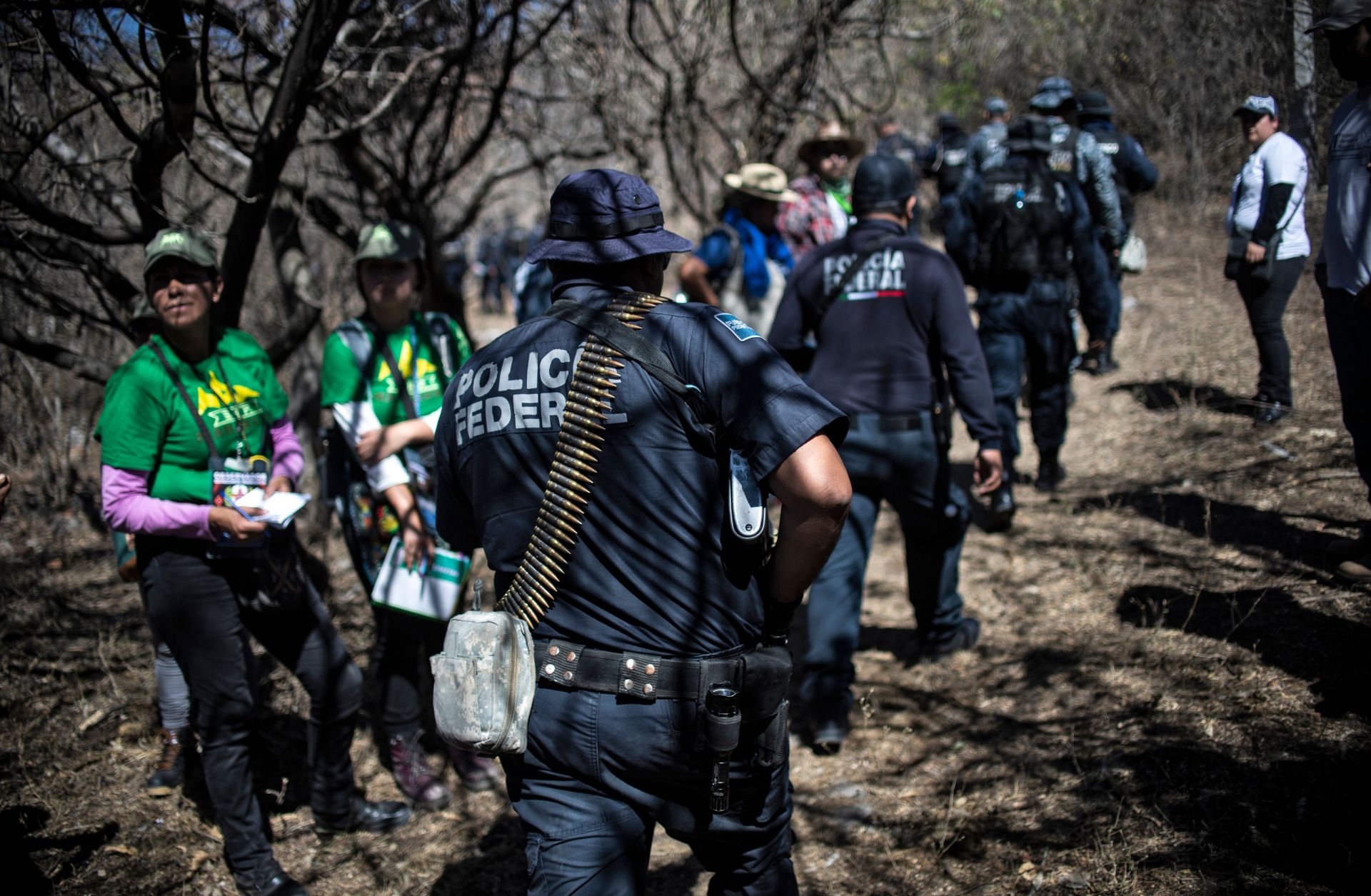 Mexican Federal Police officers participate in the fourth National Search Brigade for people who have gone missing in the drug war in Huitzuco de los Figueroa, Guerrero, on Jan. 21, 2019.