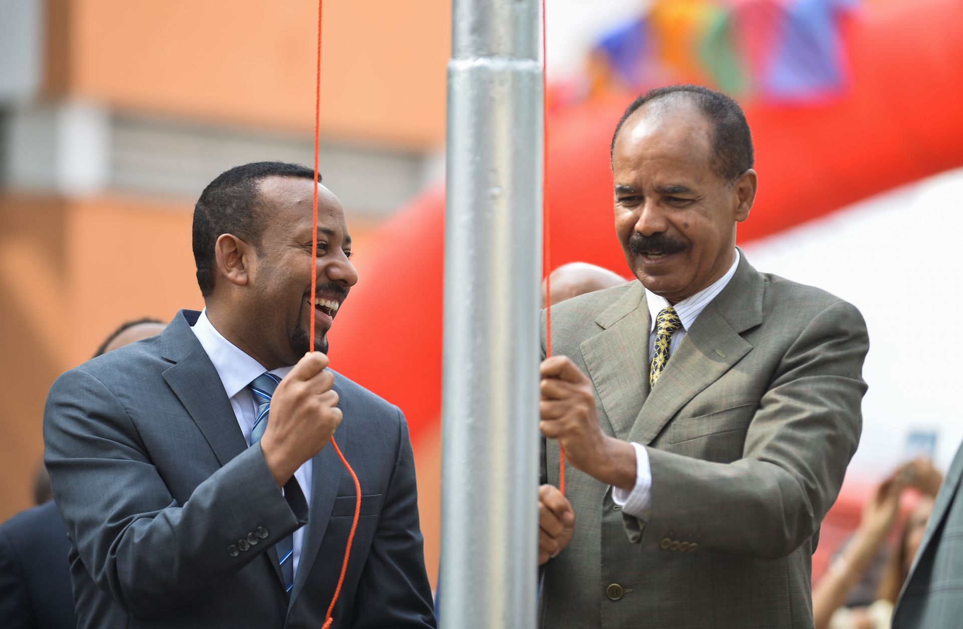 Abiy Ahmed (L), Ethiopia's prime minister, marks the reopening of the Eritrean Embassy in Addis Ababa on July 16, 2018, alongside Ertirea's president, Isaias Afwerki (R).