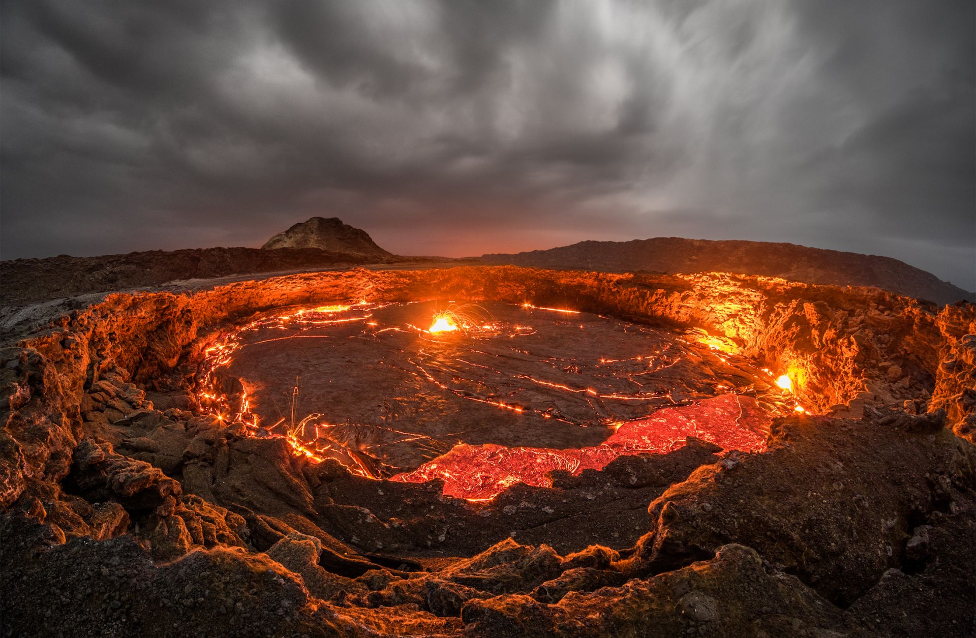 Lava rises to the top inside Erta Ale volcano in the Afar region of northeastern Ethiopia. The Ethiopian volcano is home to the world's oldest continuously active lava lake, known as the "Gateway To Hell."