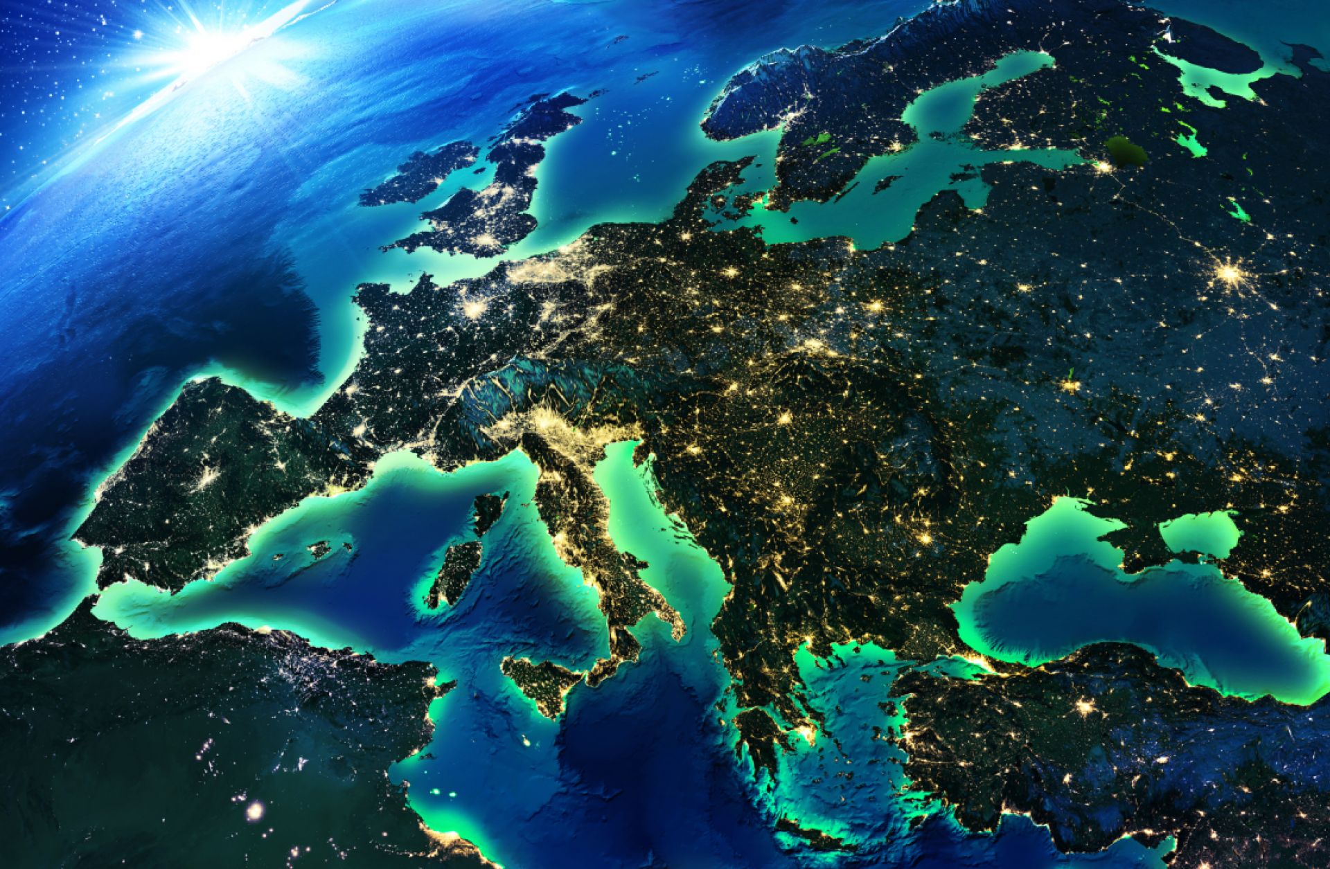 A satellite image shows Europe at night. A satellite image shows Europe at night.
