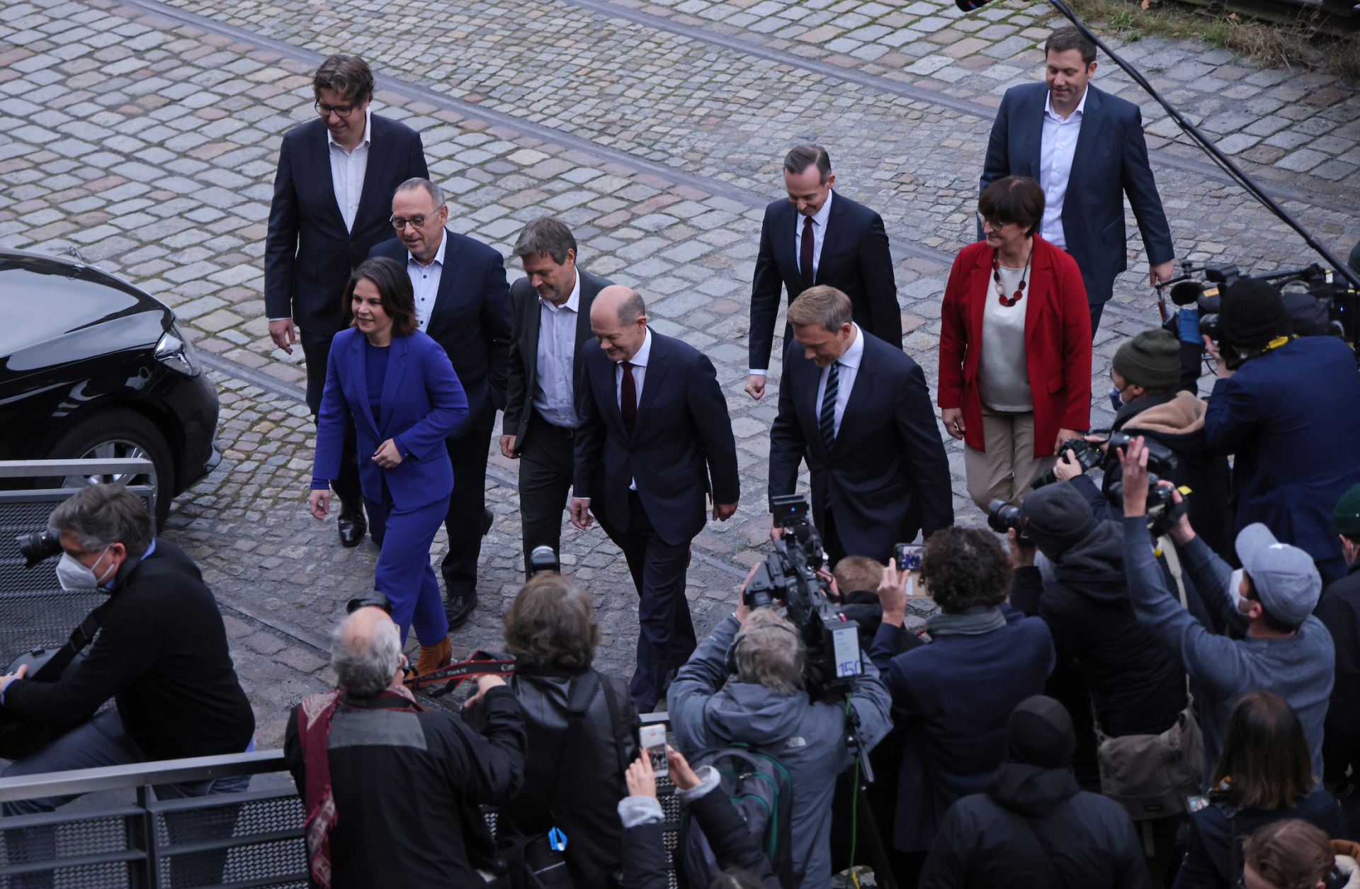 Leading members of the German Social Democrats, the Greens Party and the German Free Democrats arrive to present their mutually-agreed on coalition contract on November 24, 2021 in Berlin.