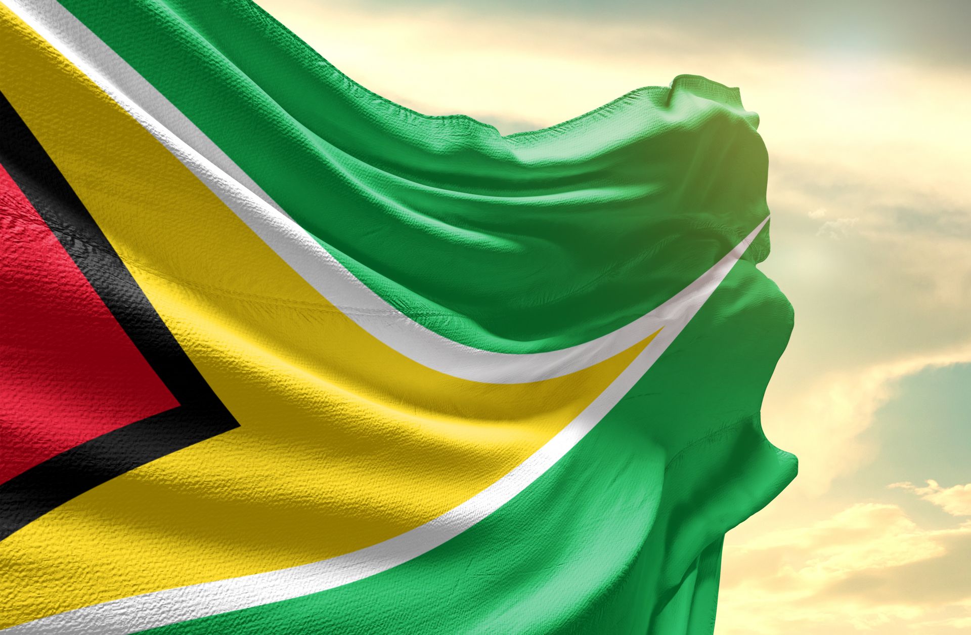 Production from Guyana's giant offshore oil field has started to come online, and the expected revenue windfall will be a key prize for the winning party in the country's upcoming election. This photo shows the Guyanese flag.