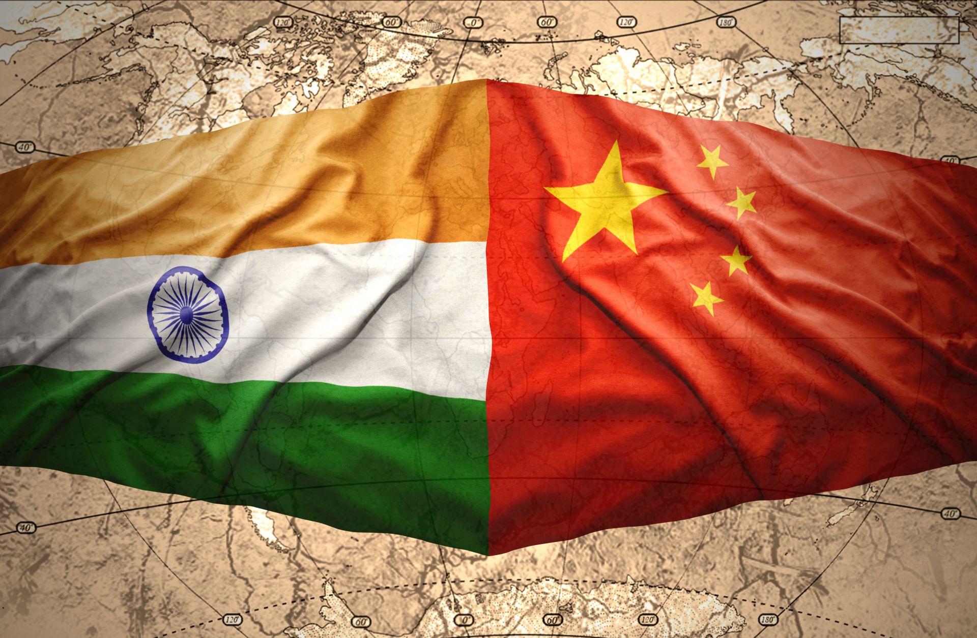 An image depicts waving Chinese and Indian flags overlaying a map of the world. An image depicts waving Chinese and Indian flags overlaying a map of the world.