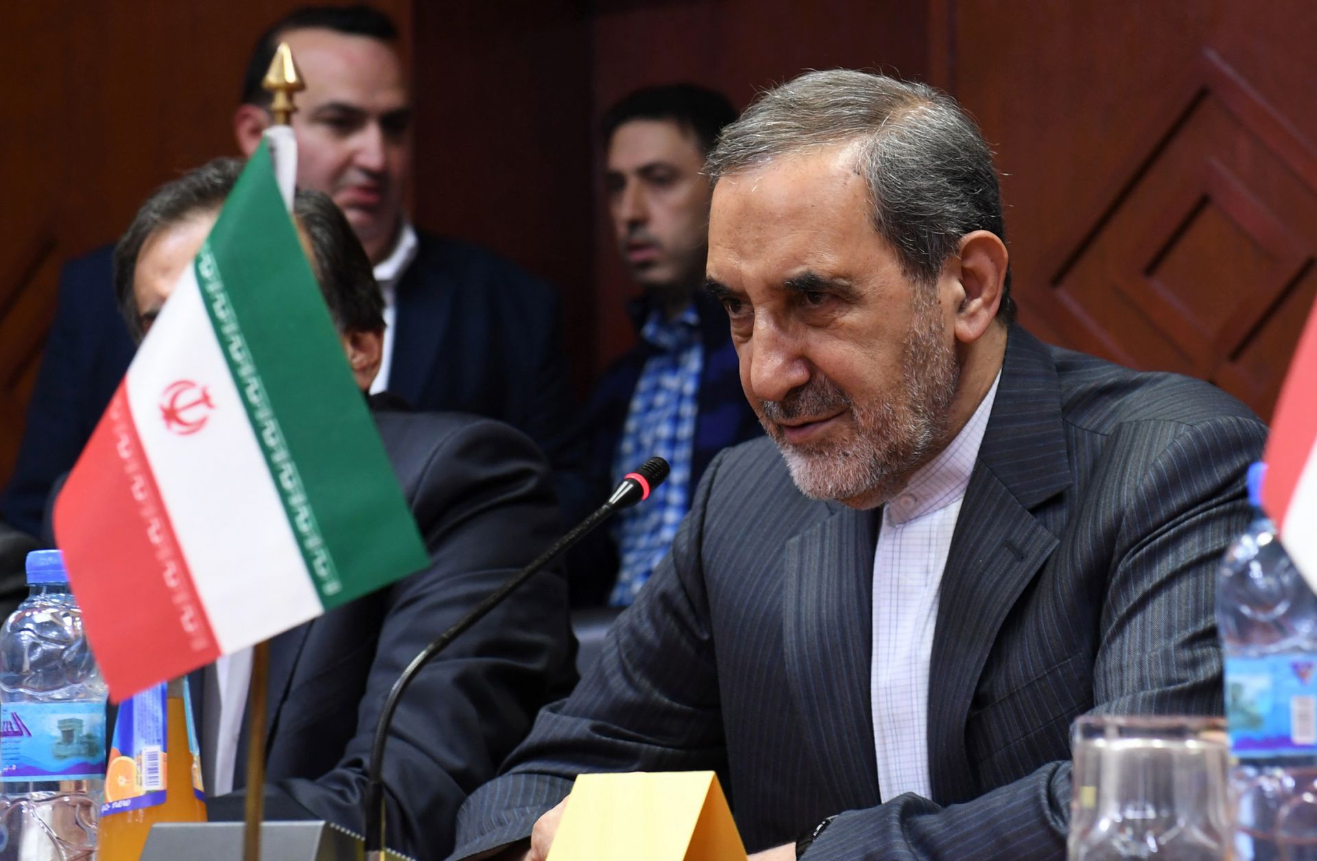 Iranian Supreme Leader Ayatollah Ali Khamenei's chief foreign policy adviser, Ali Akbar Velayati, oversees an agreement between the University of Aleppo in Syria and Iran's Islamic Azad University in November 2017. Syria is a key component in Iran's foreign policy strategy to extend its influence across the Arab world.
