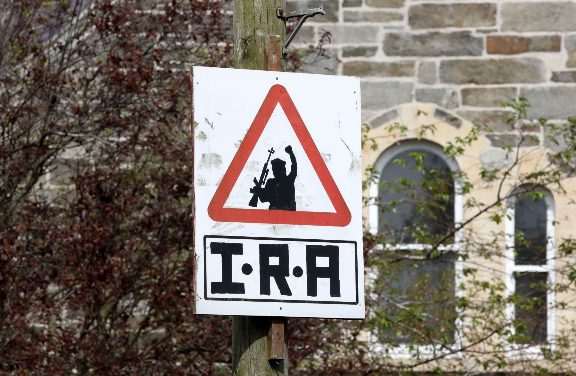 An IRA sniper warning sign on April 20, 2019, overlooking the Bogside area of Londonderry in Northern Ireland.