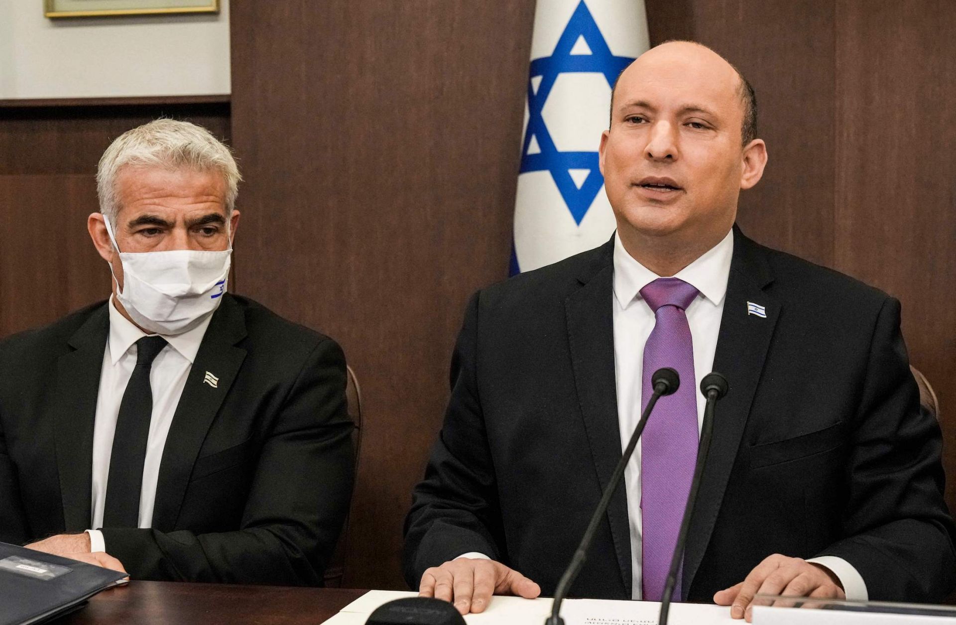 Israeli Prime Minister Naftali Bennett (R) and Foreign Minister Yair Lapid on Feb. 20, 2022, in Jerusalem.