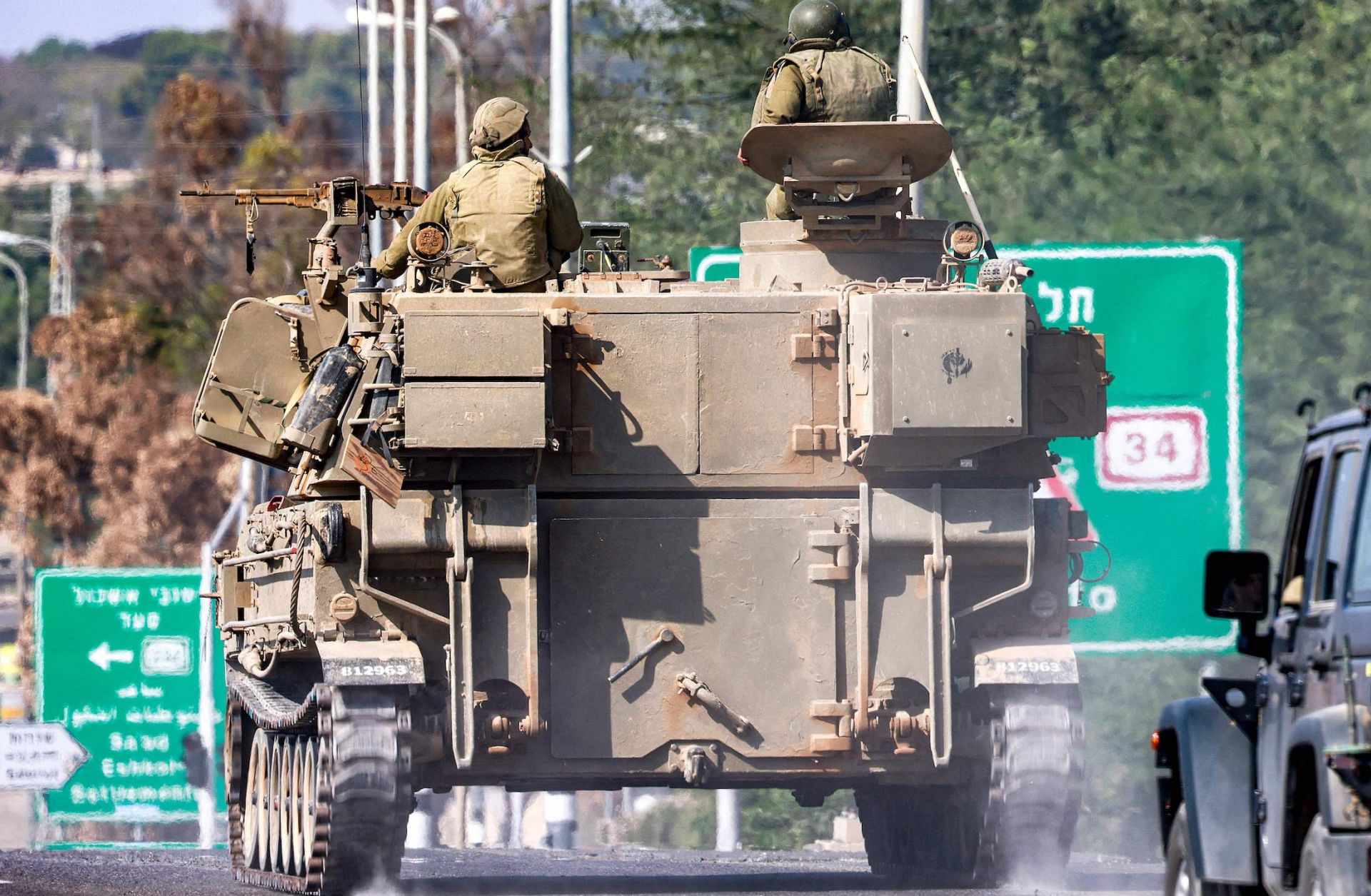 An Israeli army convoy Nov. 1, 2023, on a road near Sderot in southern Israel along the border with the Gaza Strip.