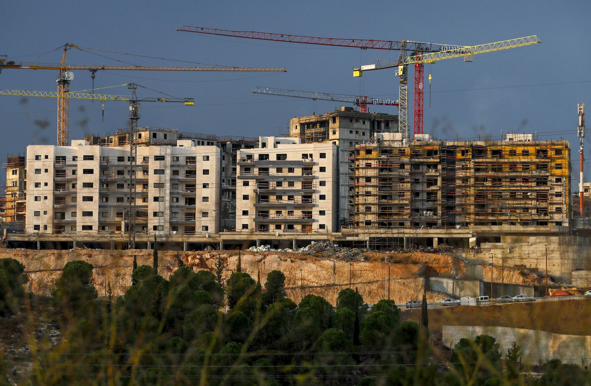 A picture taken on Nov. 12, 2020, shows a view of ongoing construction work at a Jewish settlement in the Israeli-annexed eastern sector of Jerusalem. A picture taken on Nov. 12, 2020, shows a view of ongoing construction work at a Jewish settlement in the Israeli-annexed eastern sector of Jerusalem.