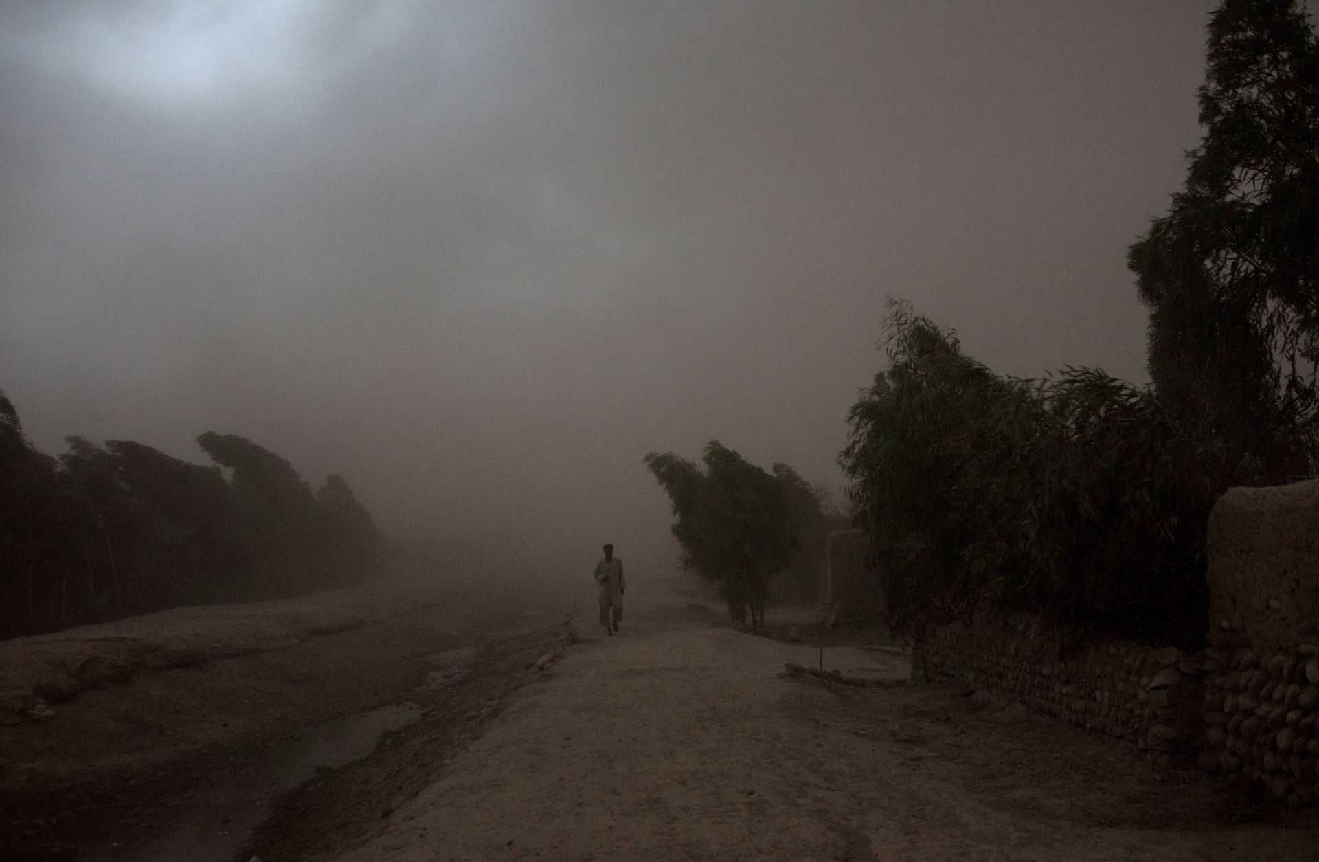 In the Surkh Rod district of Afghanistan, a man displaced by the Islamic State's Khorasan chapter makes his way home.