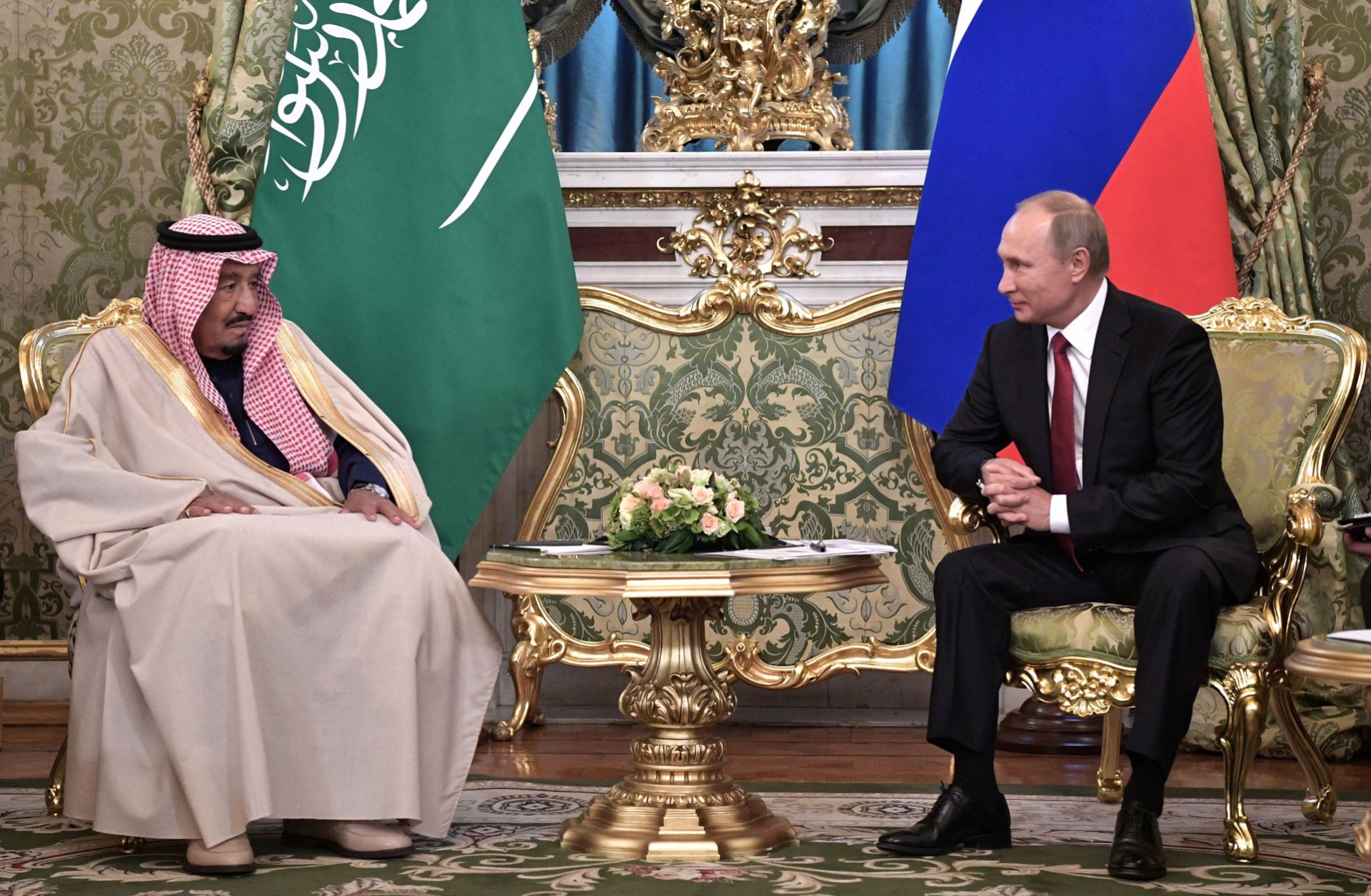 Russian President Vladimir Putin (R) meets with Saudi King Salman at the Kremlin in Moscow on Oct. 5, 2017. Saudi Arabia and Russia aren't on the friendliest of terms, but circumstances have aligned in such a way that each needs the other.