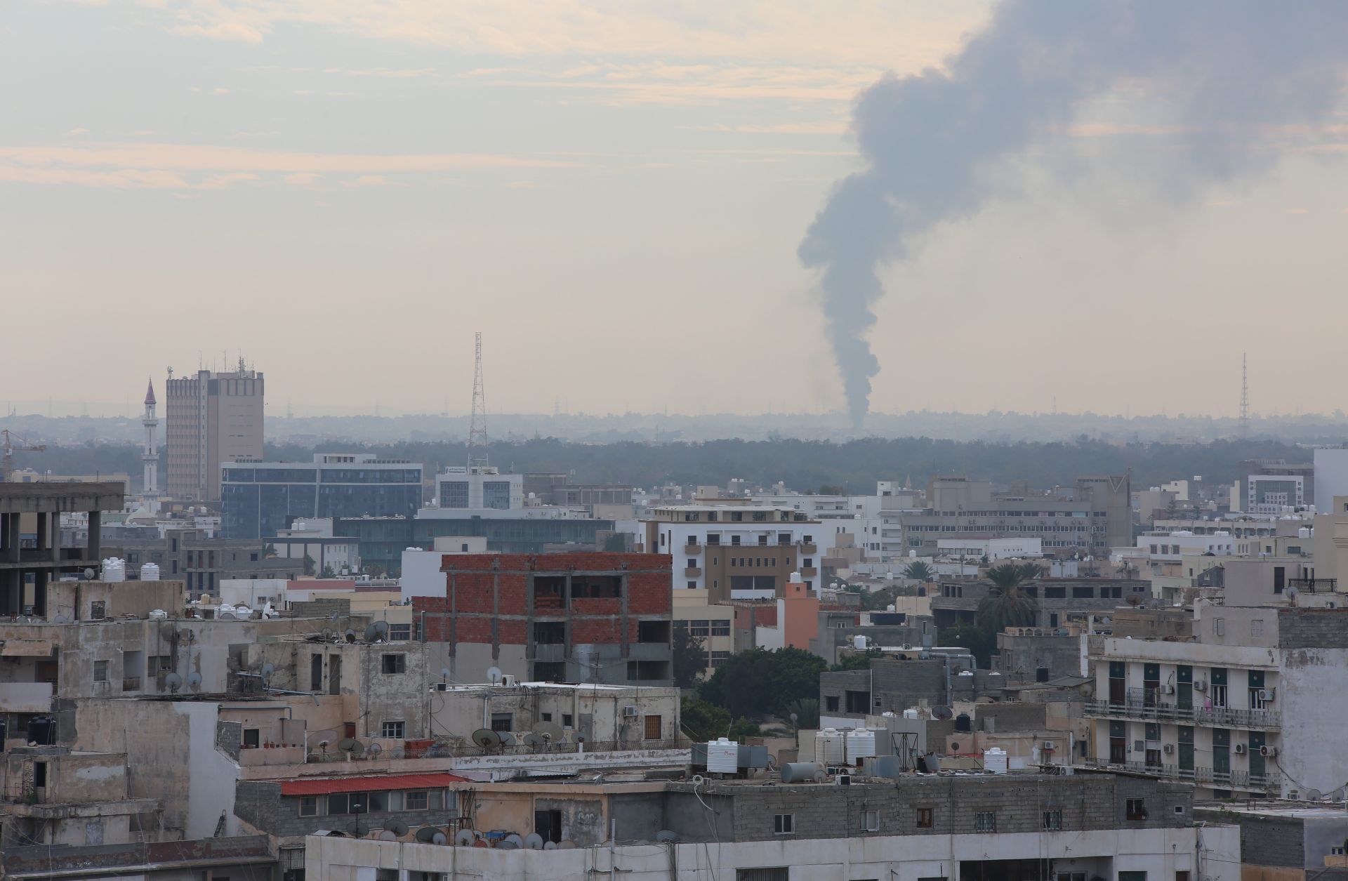 Smoke billows after an attack by Libyan National Army leader Khalifa Hifter on Tripoli on Jan. 19, 2019. 